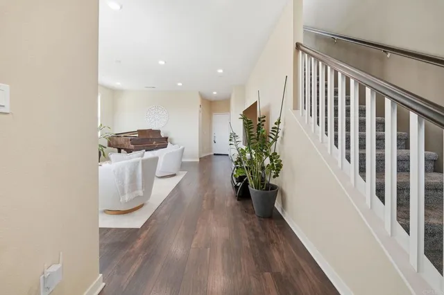 a living room with furniture a window and a couch