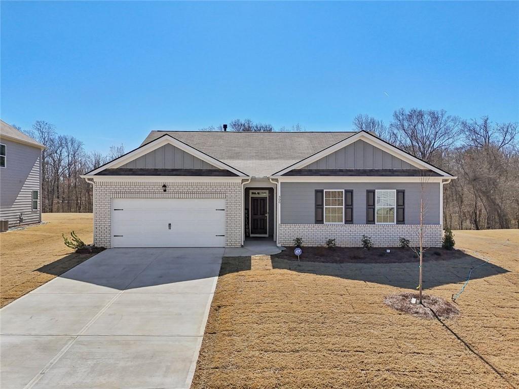 500 Brookfield Drive Braselton, GA 30517 - Photo 1 of 1 a front view of a house with yard