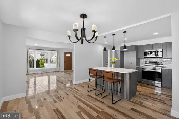 a kitchen with counter space cabinets and appliances