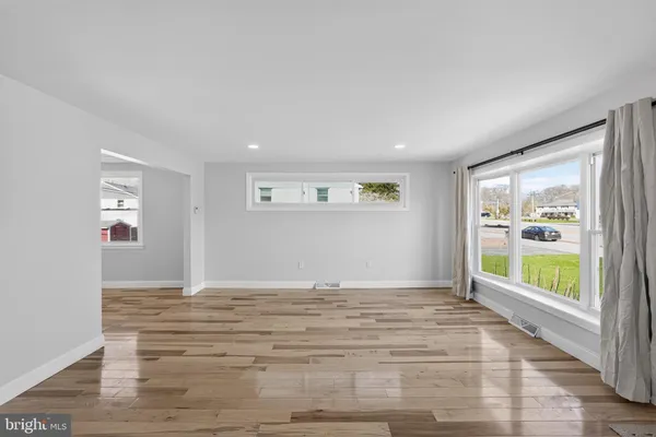 a view of an empty room and window