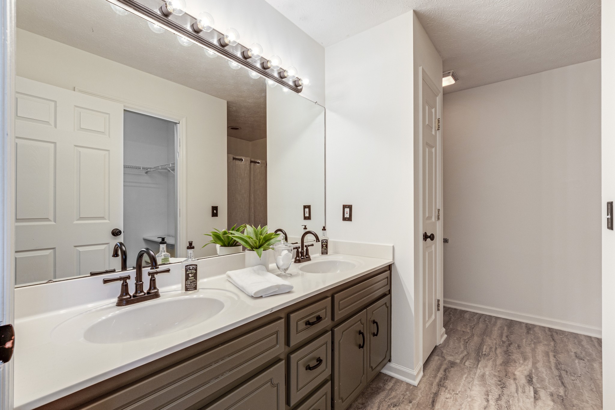1898 Belotes Ferry Road Lebanon, TN 37087 - Photo 17 of 26 a bathroom with a sink and a mirror