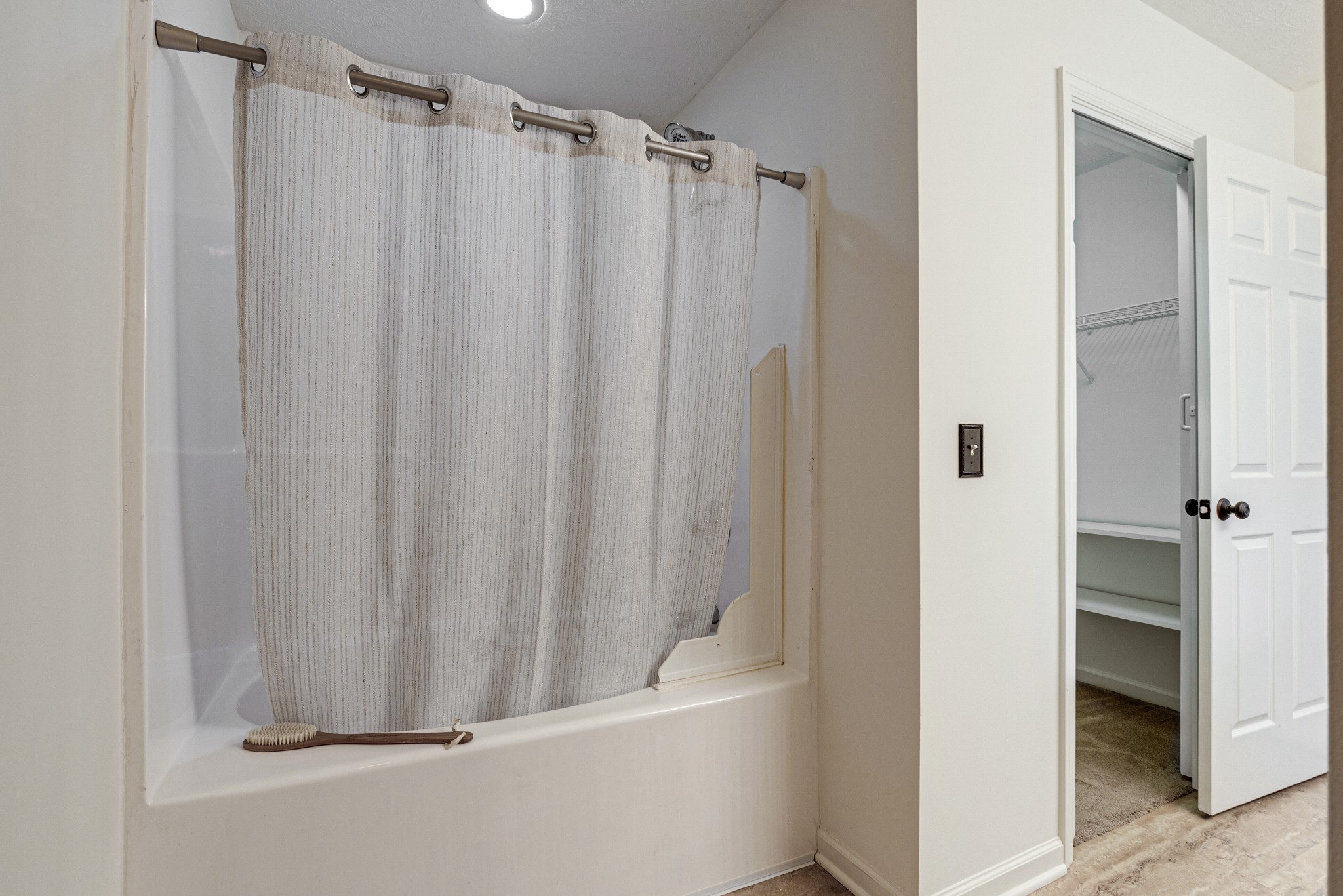 1898 Belotes Ferry Road Lebanon, TN 37087 - Photo 19 of 26 a bathroom with a shower and a tub