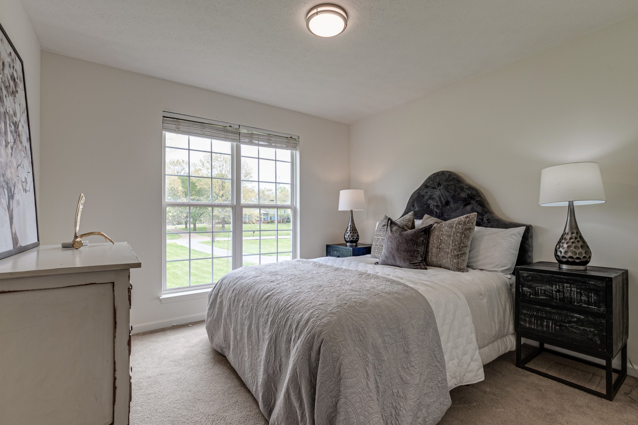 1898 Belotes Ferry Road Lebanon, TN 37087 - Photo 21 of 26 a bedroom with a bed and a window