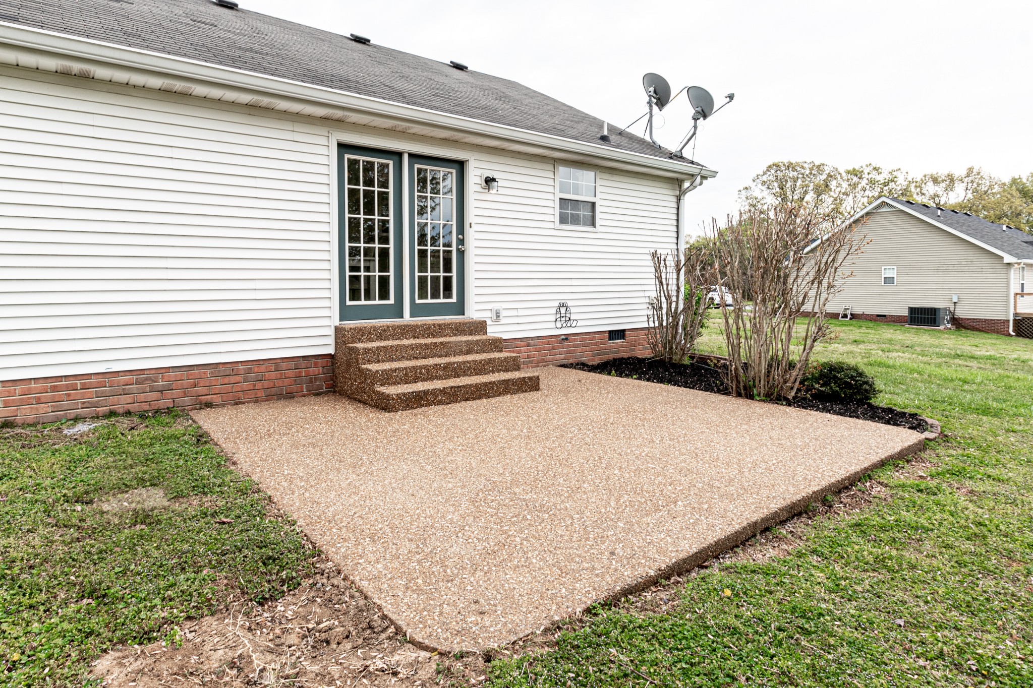 1898 Belotes Ferry Road Lebanon, TN 37087 - Photo 23 of 26 a front view of a house with a yard and garage