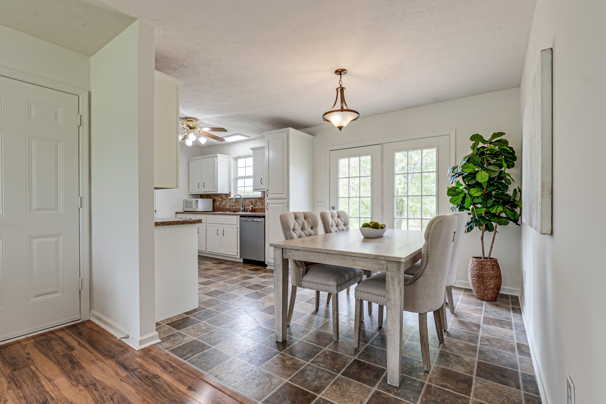 1898 Belotes Ferry Road Lebanon, TN 37087 - Photo 8 of 26 a view of a dining room with furniture and a potted plant