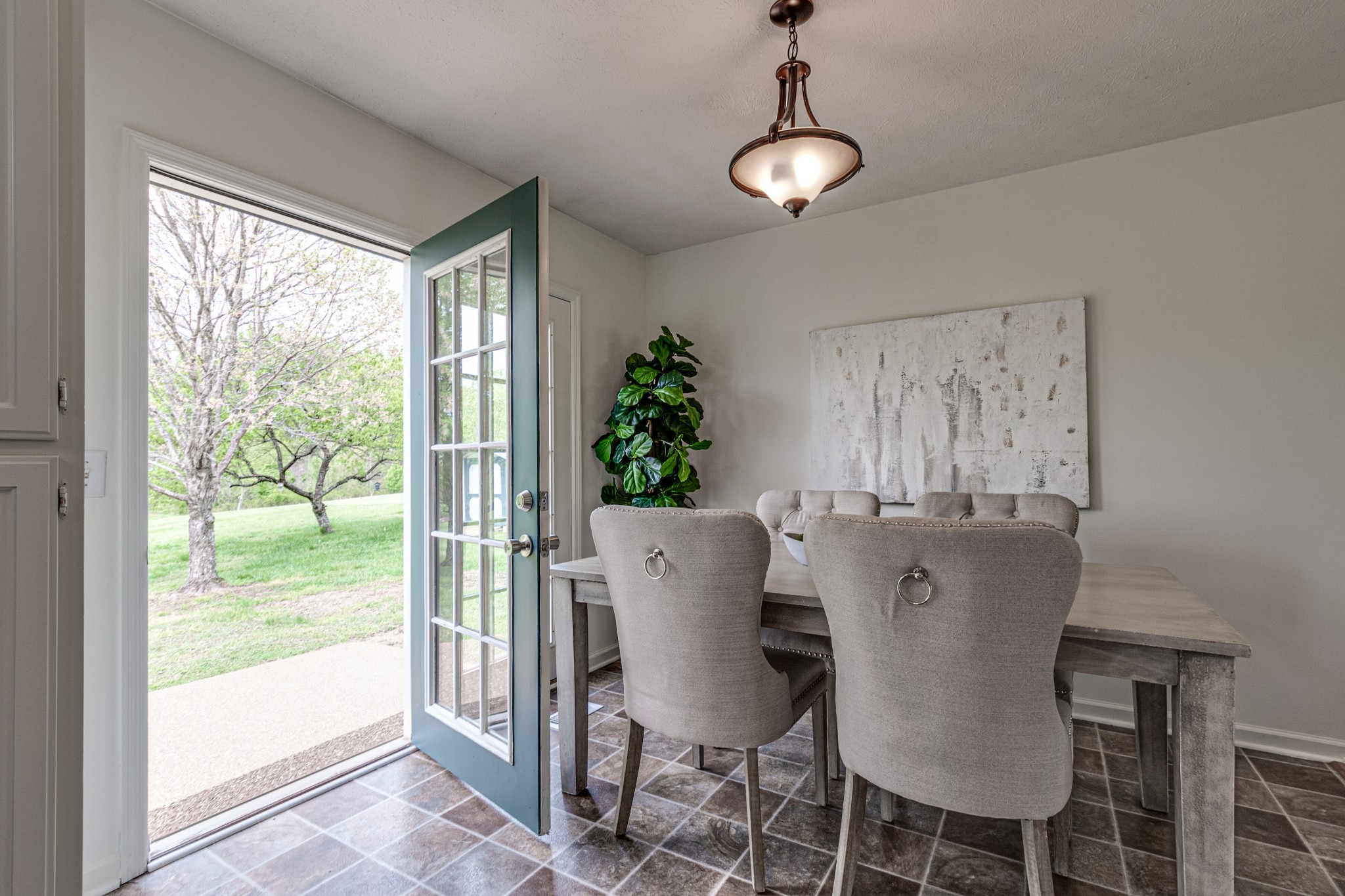 1898 Belotes Ferry Road Lebanon, TN 37087 - Photo 10 of 26 a view of a dining room with furniture window and wooden floor