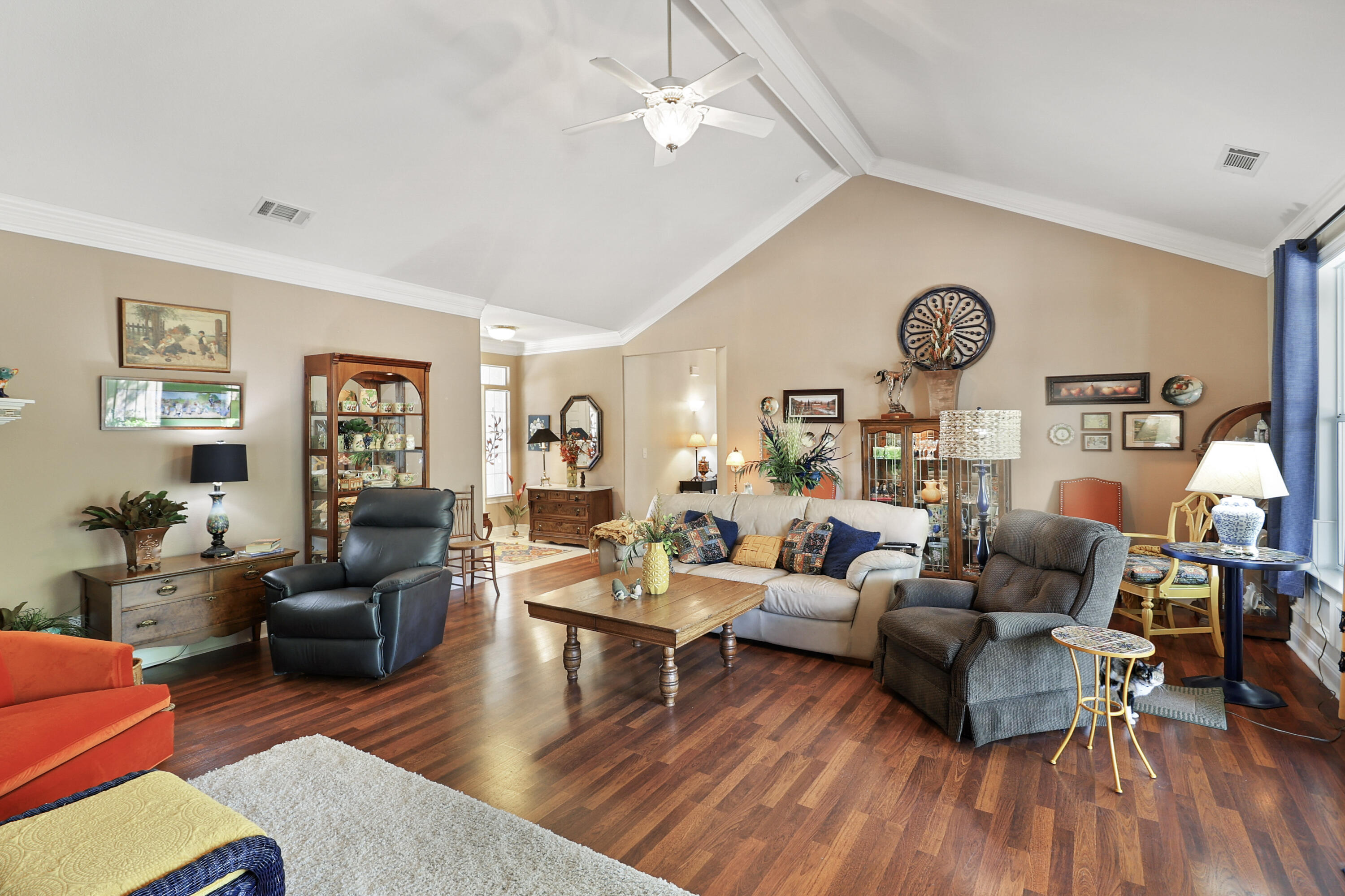 2210 Drexel Way Redding, CA 96001 - Photo 11 of 57 a living room with furniture kitchen view and a wooden floor