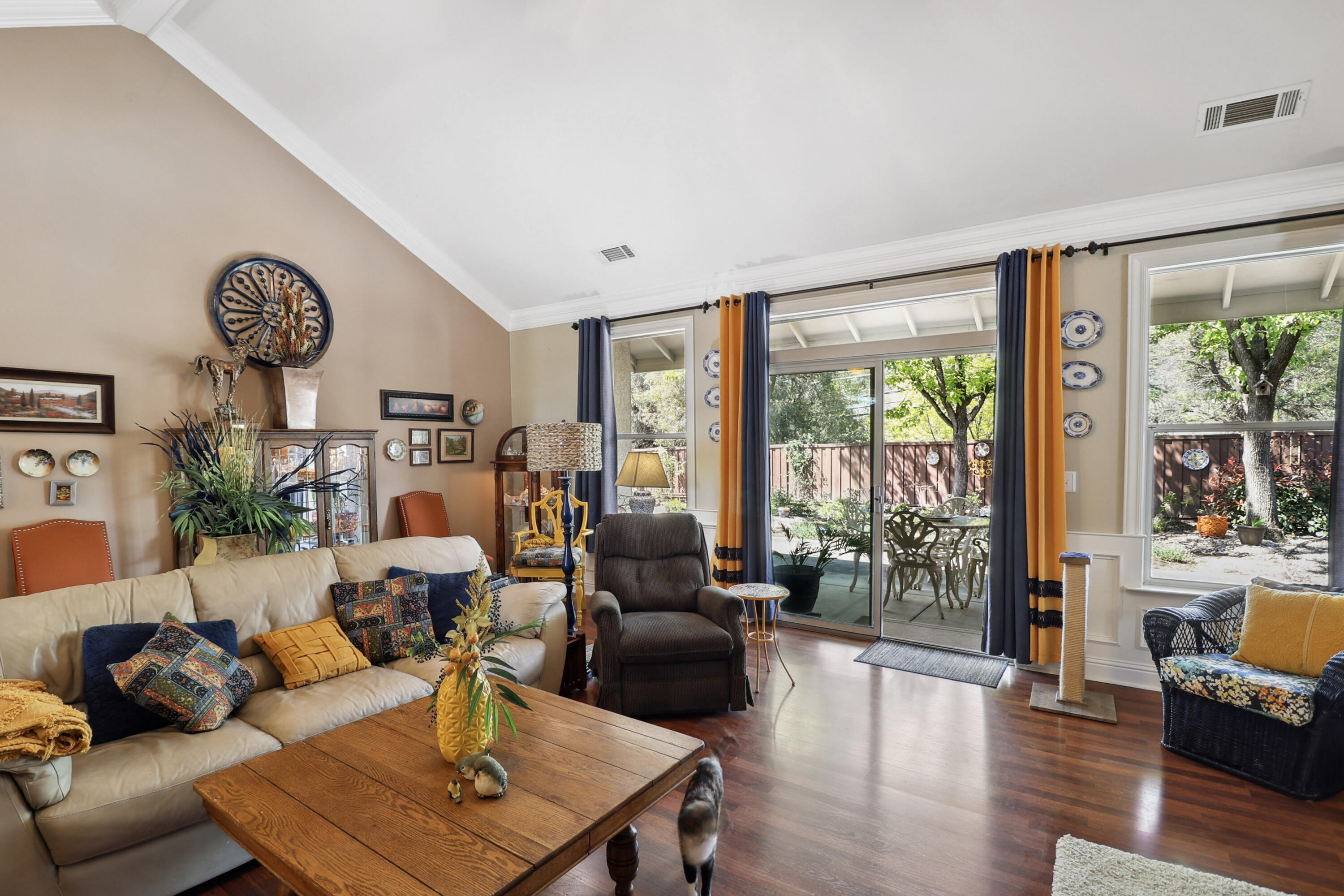 2210 Drexel Way Redding, CA 96001 - Photo 12 of 57 a living room with furniture and a large window