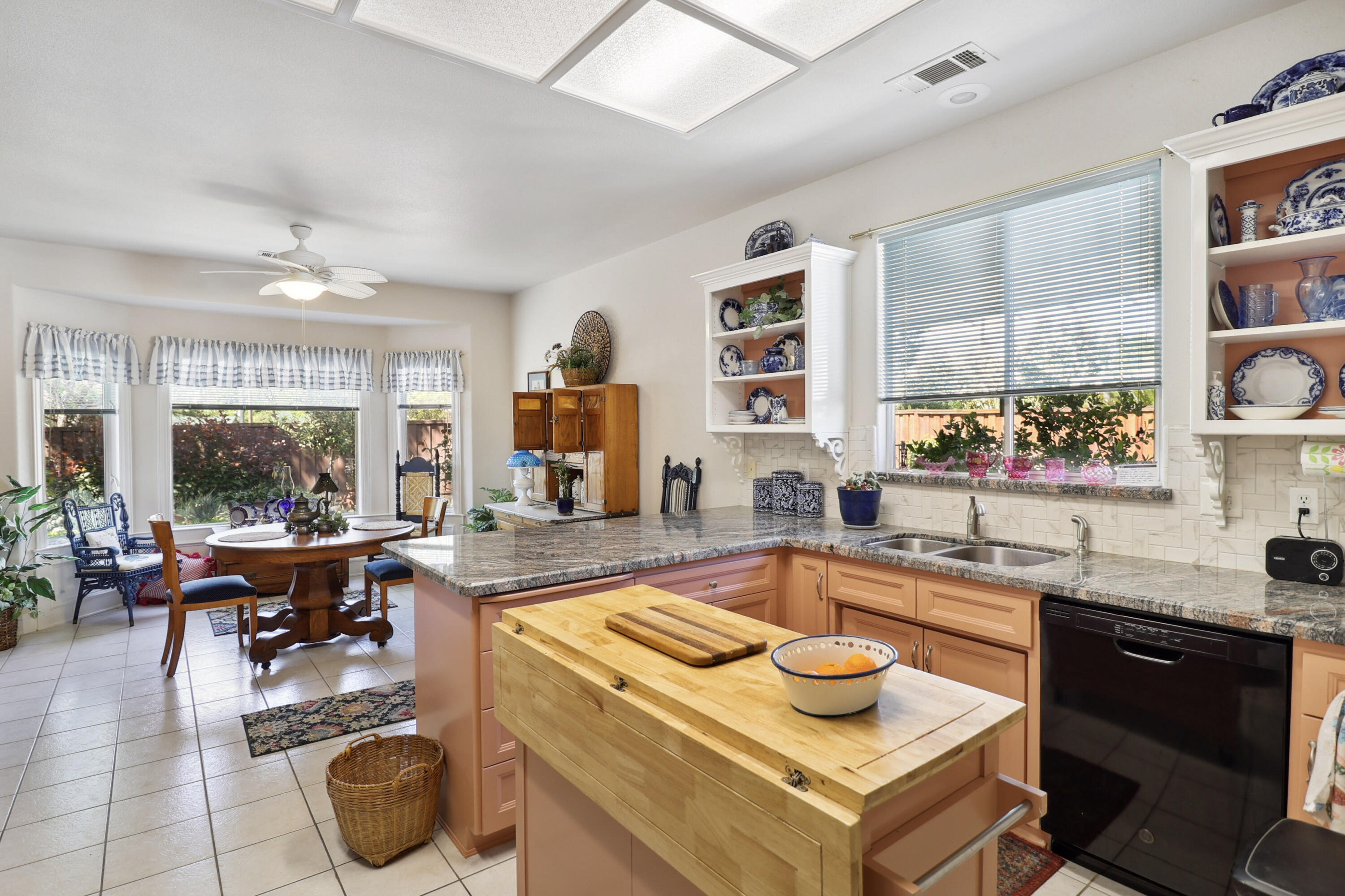 2210 Drexel Way Redding, CA 96001 - Photo 17 of 57 a kitchen with a sink and a stove top oven