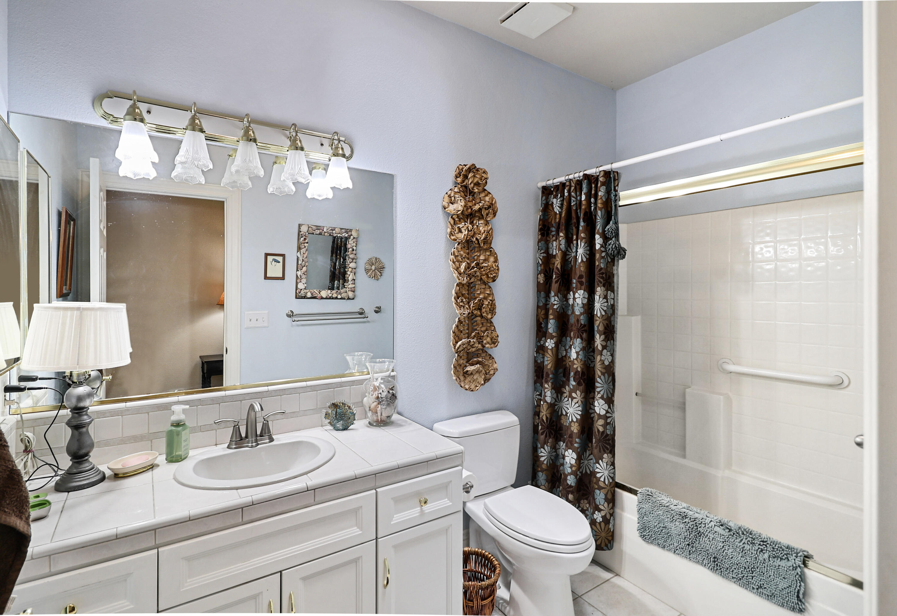 2210 Drexel Way Redding, CA 96001 - Photo 21 of 57 a bathroom with a sink a toilet and shower