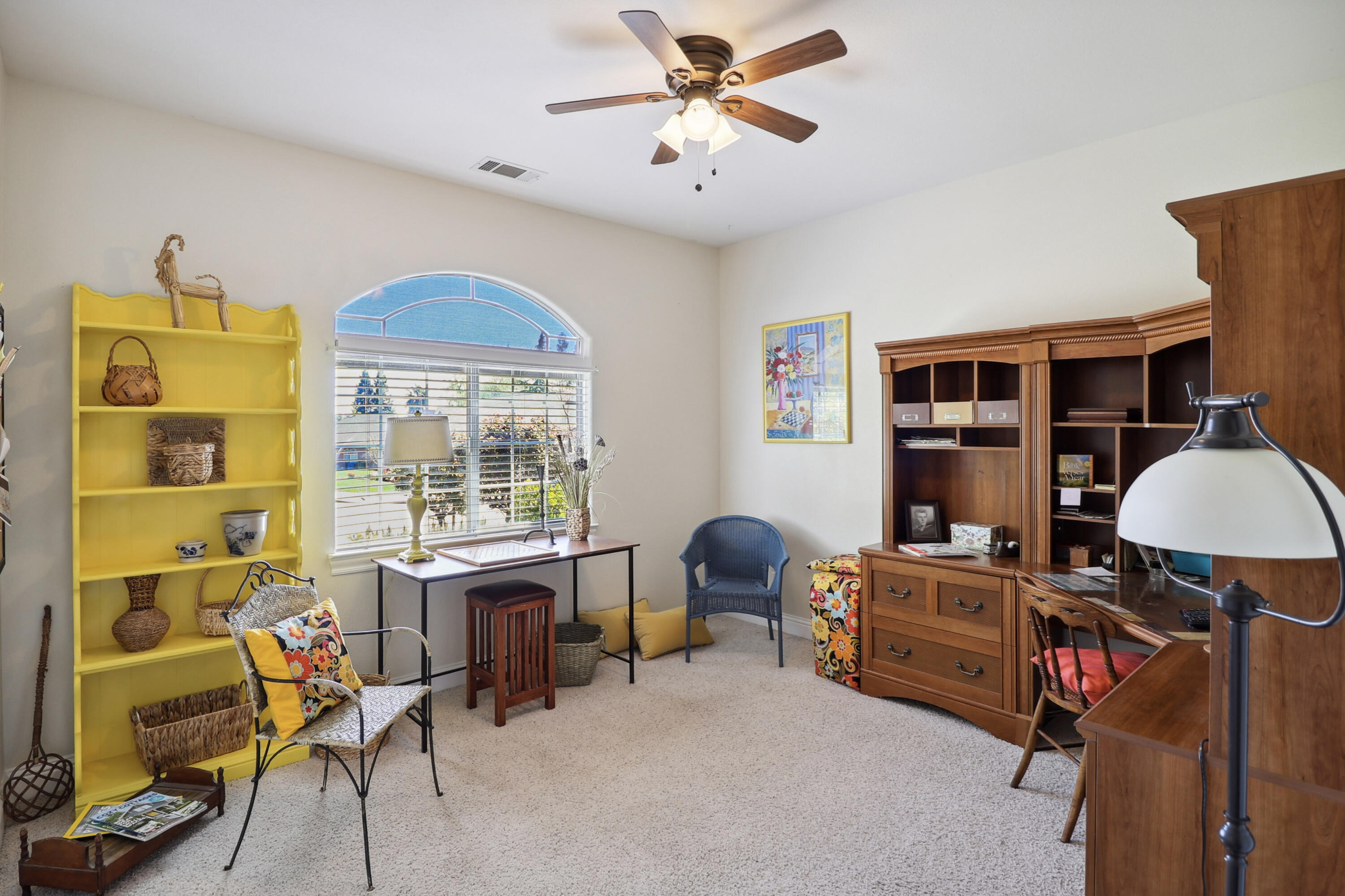 2210 Drexel Way Redding, CA 96001 - Photo 24 of 57 a view of a workspace with furniture and a window