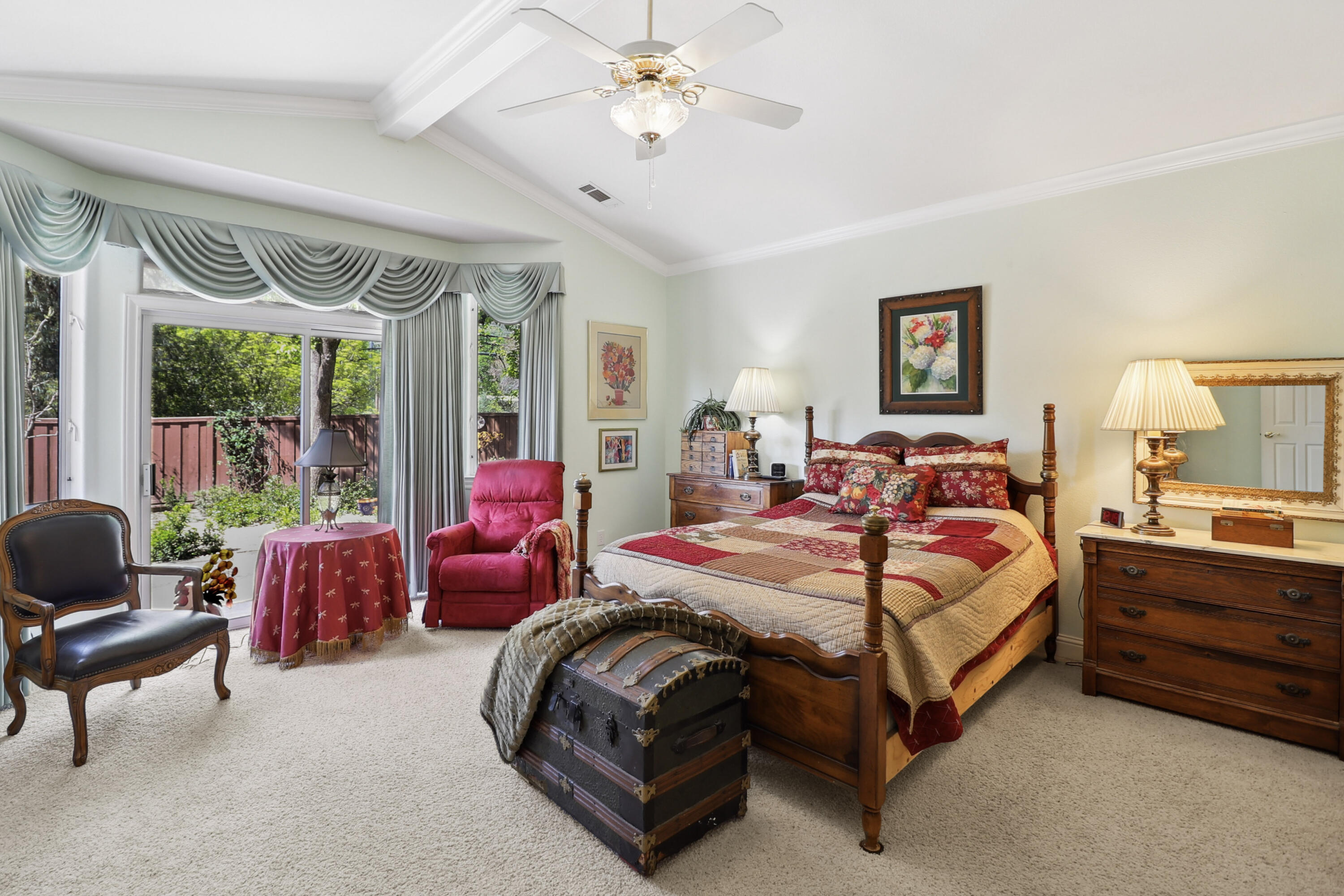 2210 Drexel Way Redding, CA 96001 - Photo 29 of 57 a bedroom with a bed and wooden floor