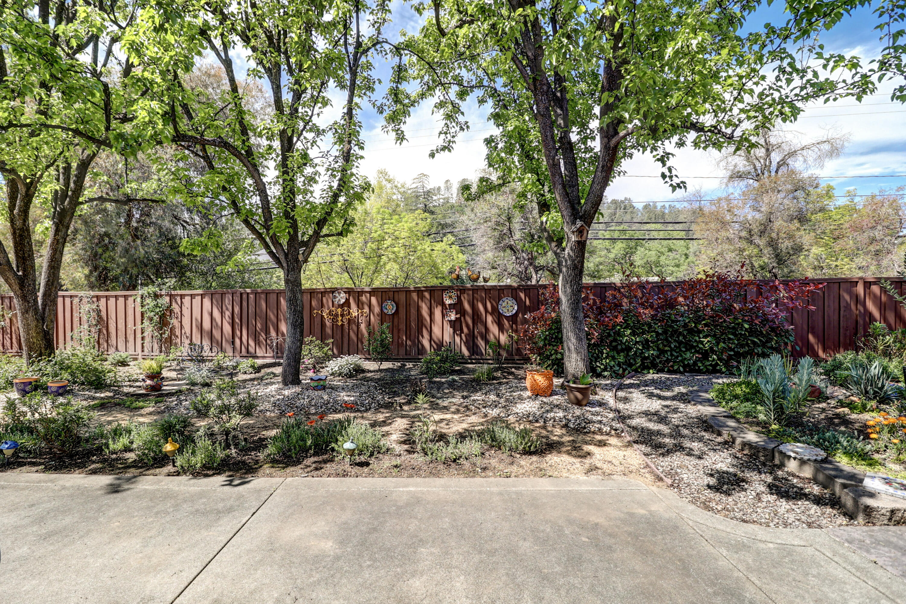 2210 Drexel Way Redding, CA 96001 - Photo 45 of 57 a backyard of a house with lots of green space