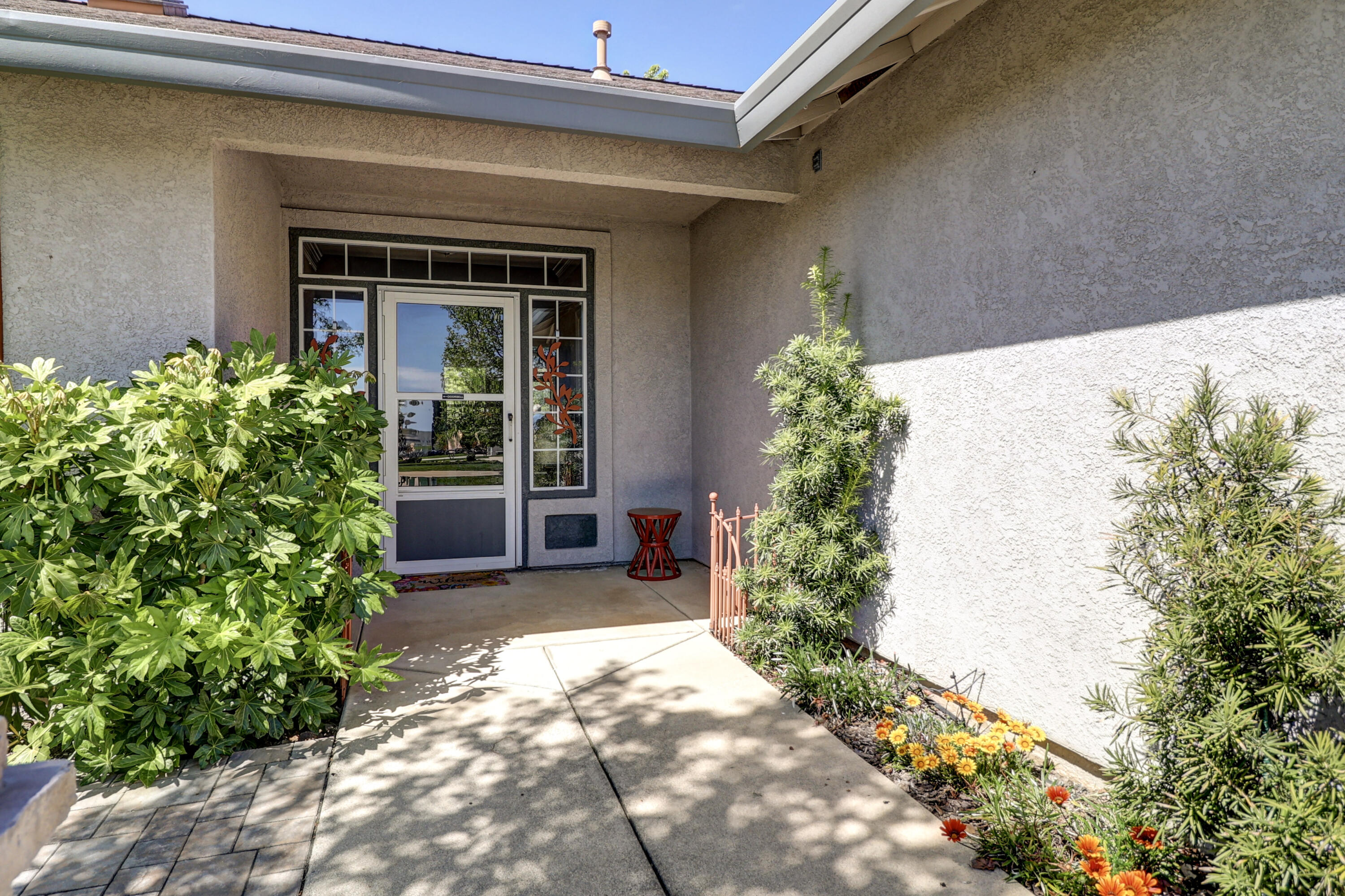 2210 Drexel Way Redding, CA 96001 - Photo 7 of 57 a front view of a house with a garden