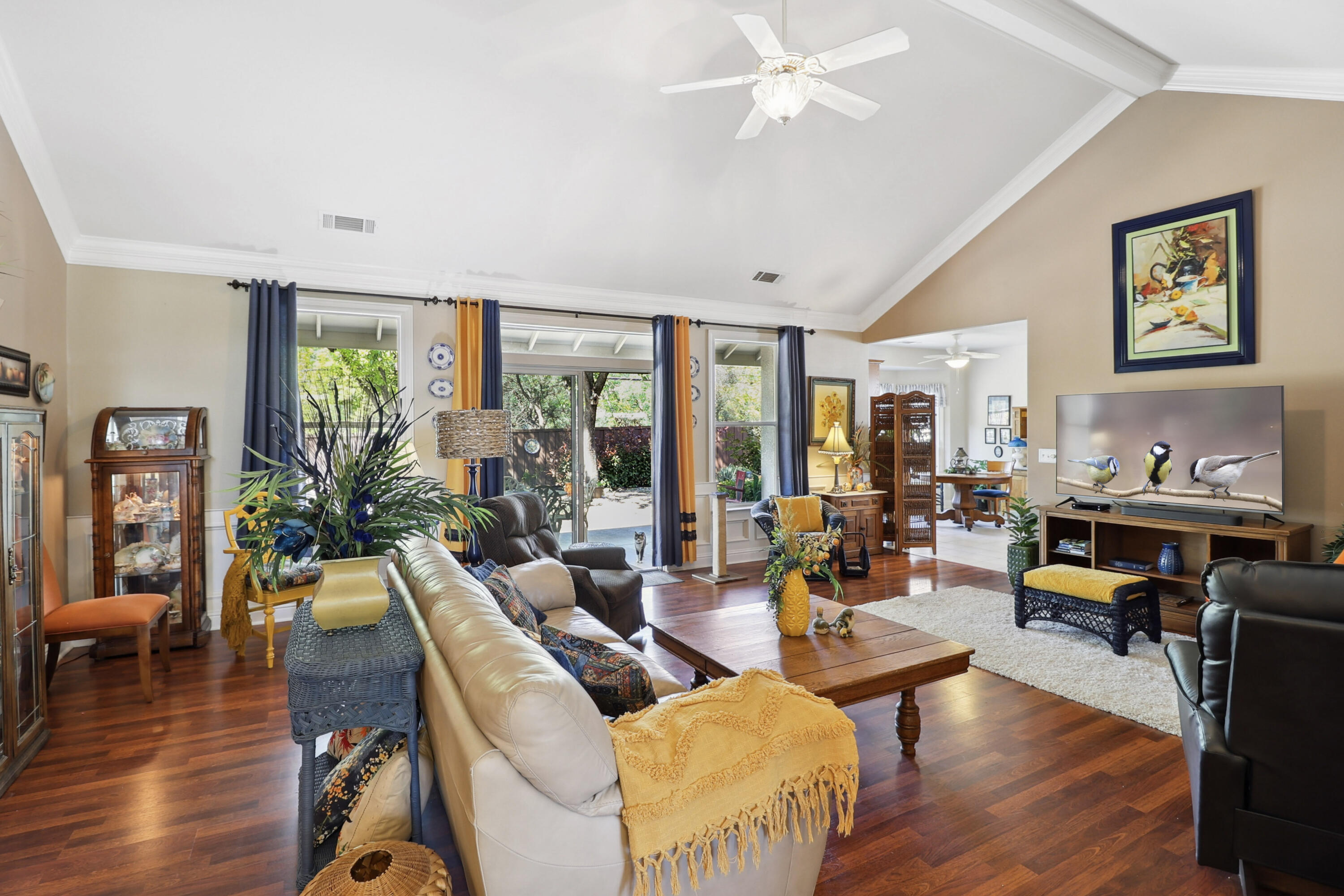 2210 Drexel Way Redding, CA 96001 - Photo 9 of 57 a living room with fireplace furniture and a large window