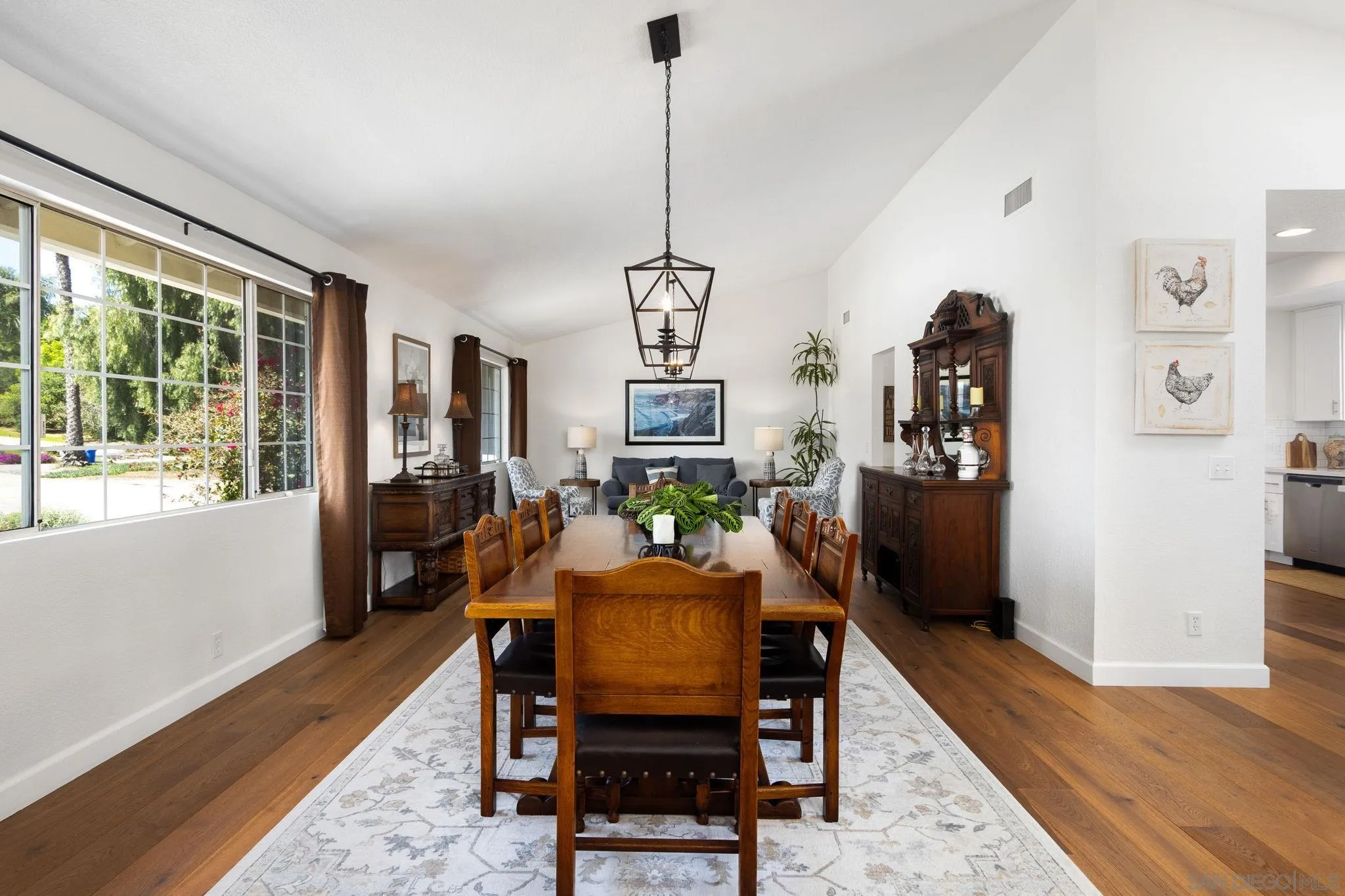 360 Futurity Lane Fallbrook, CA 92028 - Photo 16 of 58 a view of a dining room with furniture window and wooden floor