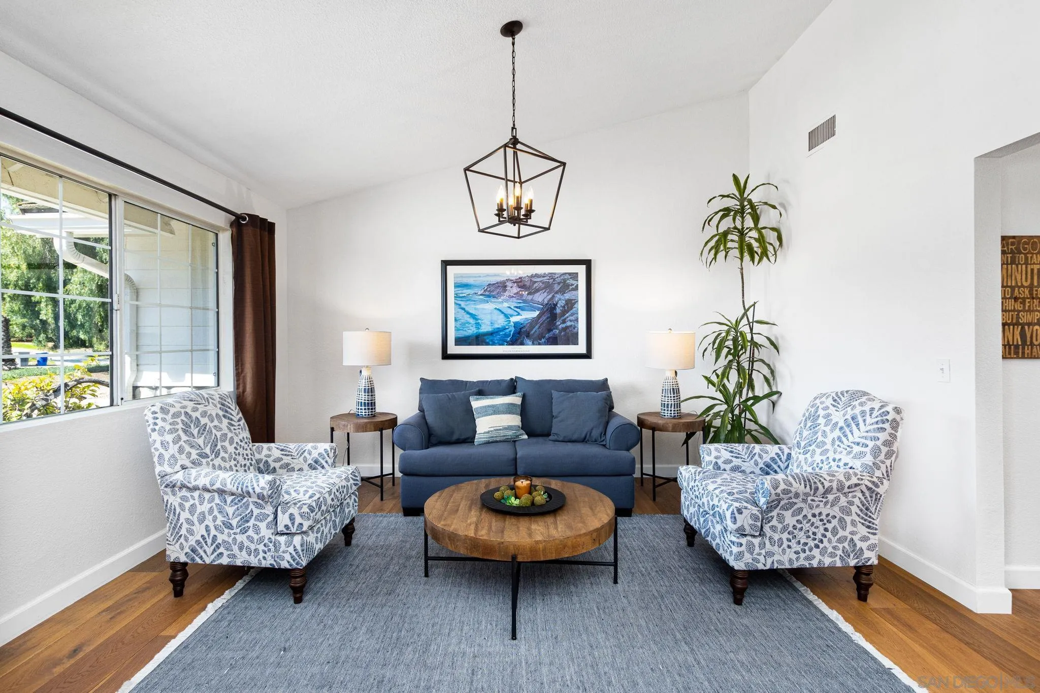 360 Futurity Lane Fallbrook, CA 92028 - Photo 17 of 58 a living room with furniture and a large window
