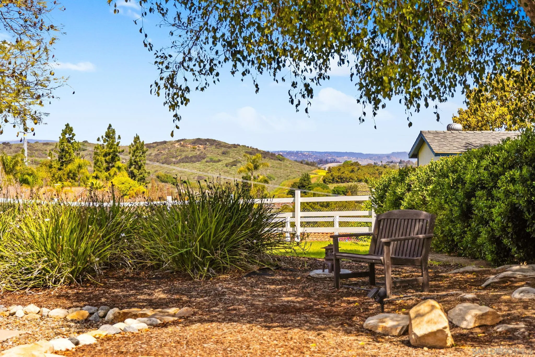 360 Futurity Lane Fallbrook, CA 92028 - Photo 43 of 58 a view of a chairs and table in the backyard