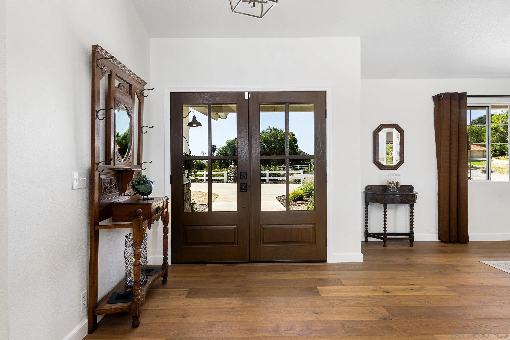 360 Futurity Lane Fallbrook, CA 92028 - Photo 6 of 58 a view of living room kitchen and livingroom