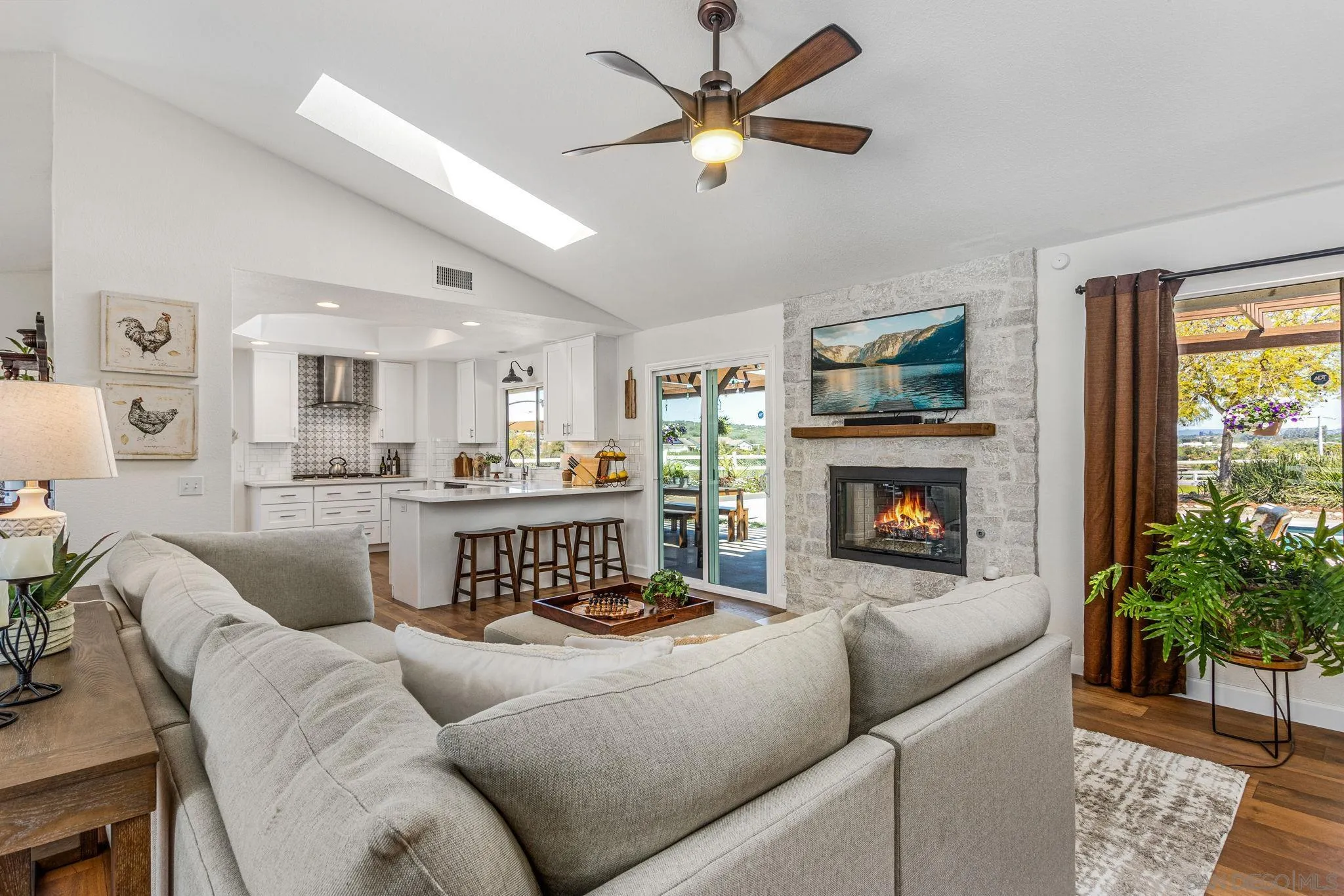 360 Futurity Lane Fallbrook, CA 92028 - Photo 9 of 58 a living room with furniture and a fireplace