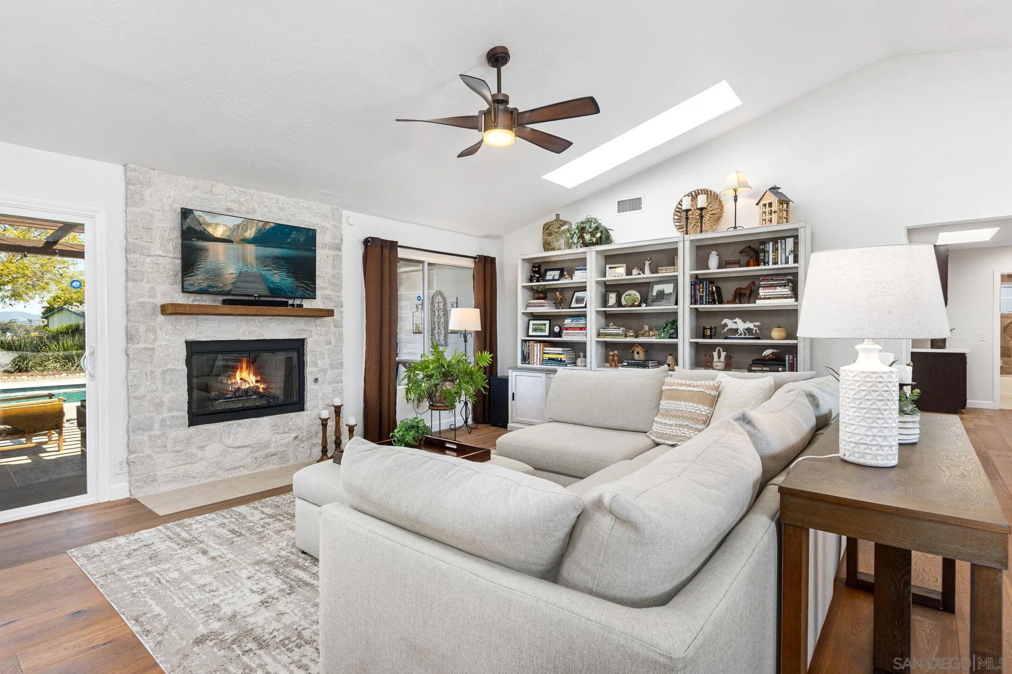 360 Futurity Lane Fallbrook, CA 92028 - Photo 10 of 58 a living room with furniture fireplace and rug