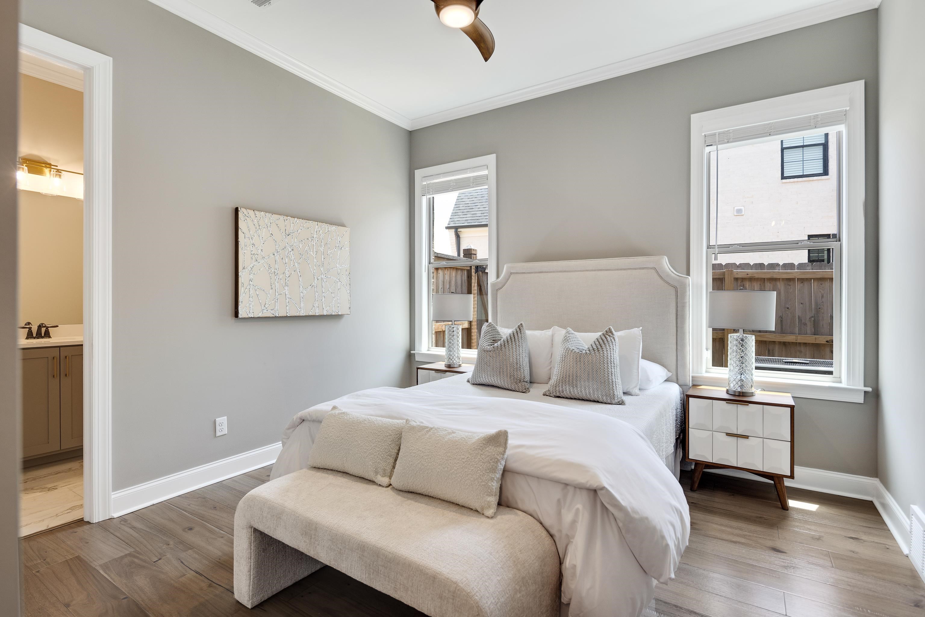 237 Beckham Drive Collierville, TN 38017 - Photo 21 of 40 Bedroom featuring ornamental molding, wood finished floors, baseboards, ensuite bathroom, and ceiling fan