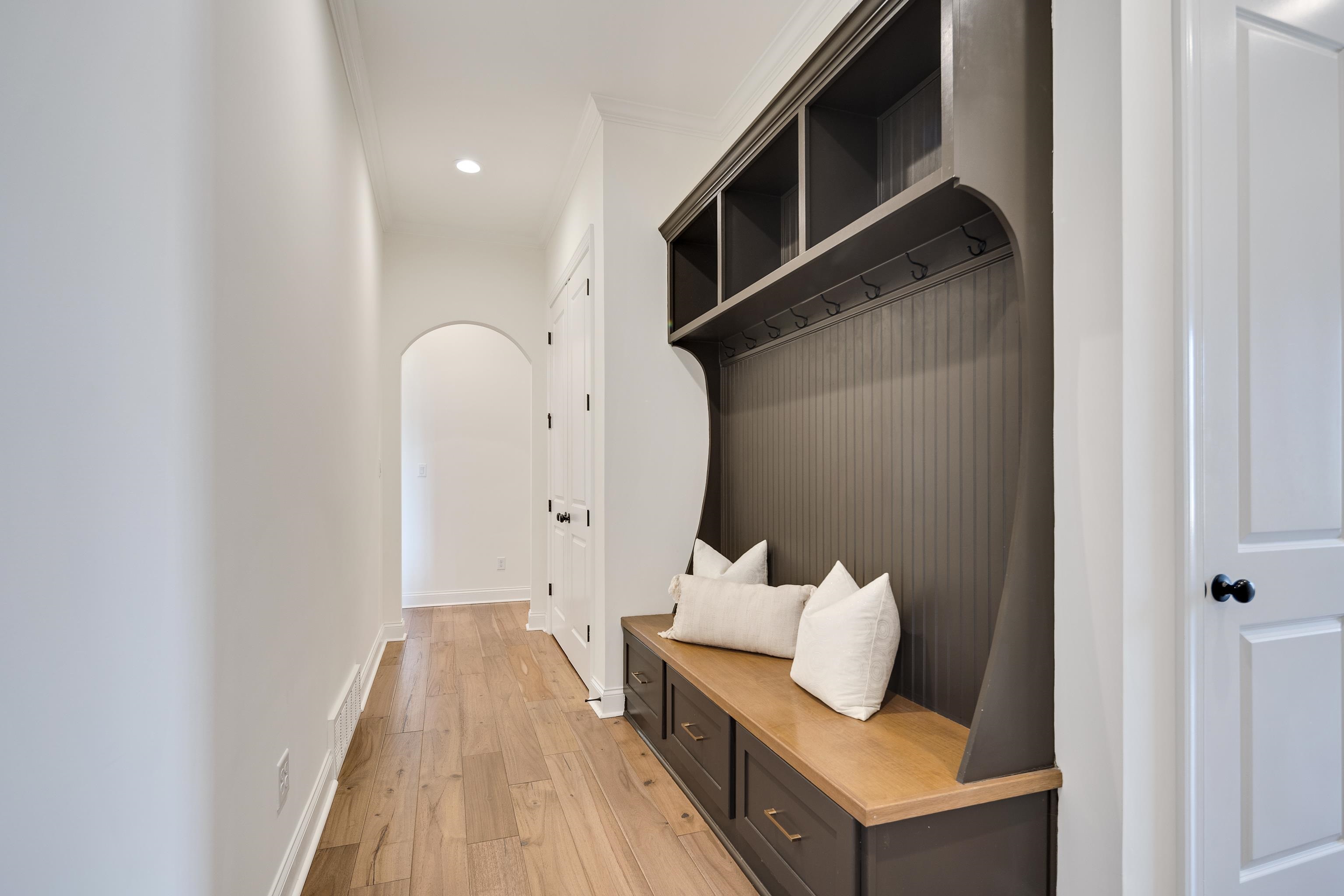 237 Beckham Drive Collierville, TN 38017 - Photo 25 of 40 Mudroom with light wood-style flooring, crown molding, recessed lighting, and baseboards