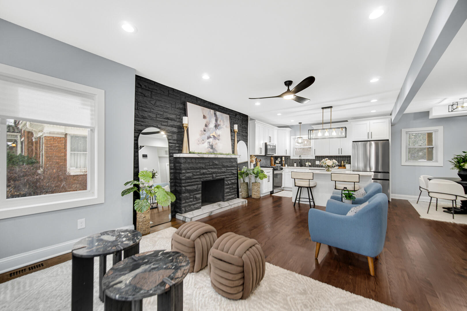 4354 Washington Street Gary, IN 46408 - Photo 3 of 32 a living room with fireplace furniture and a table