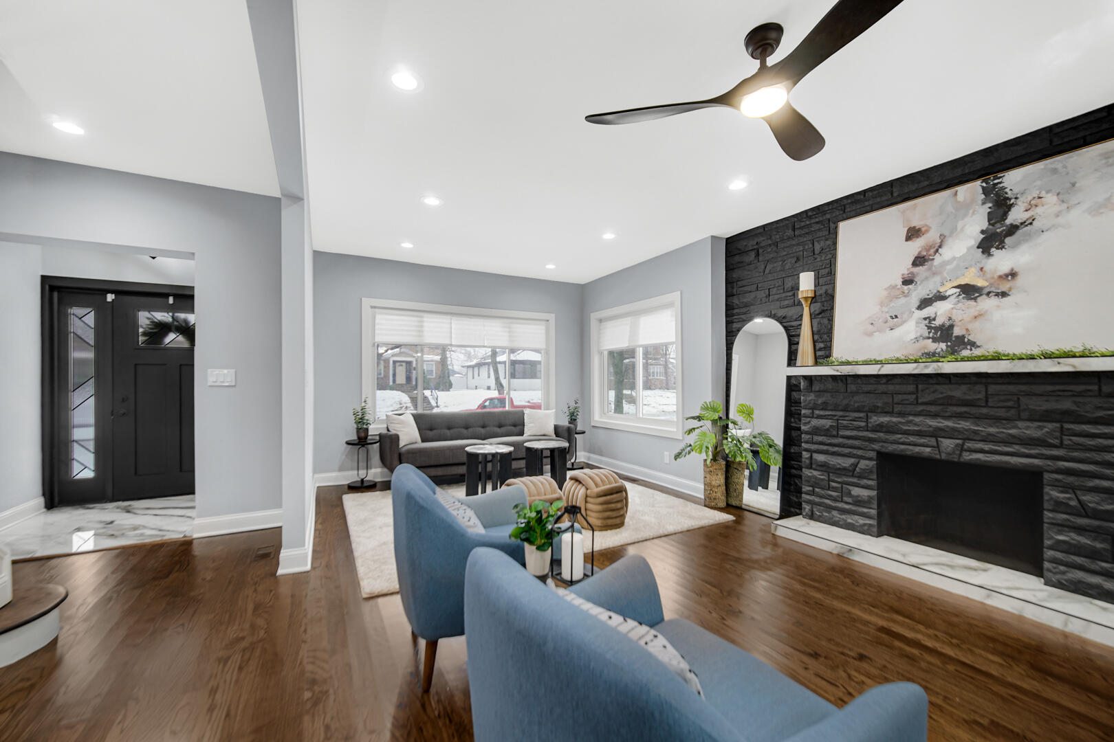 4354 Washington Street Gary, IN 46408 - Photo 4 of 32 a living room with furniture and a fireplace