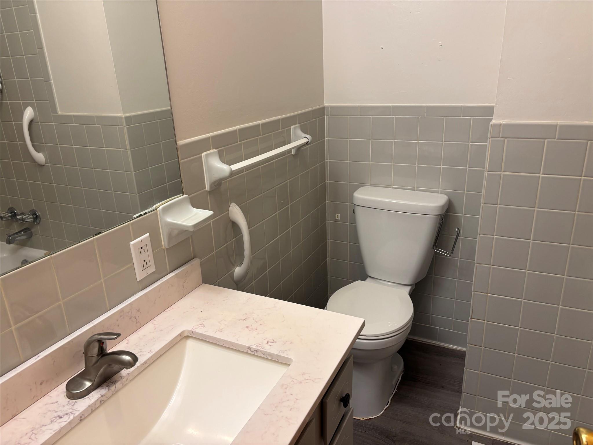 105 Cooper Drive Nebo, NC 28761 - Photo 12 of 17 a bathroom with a toilet and a sink