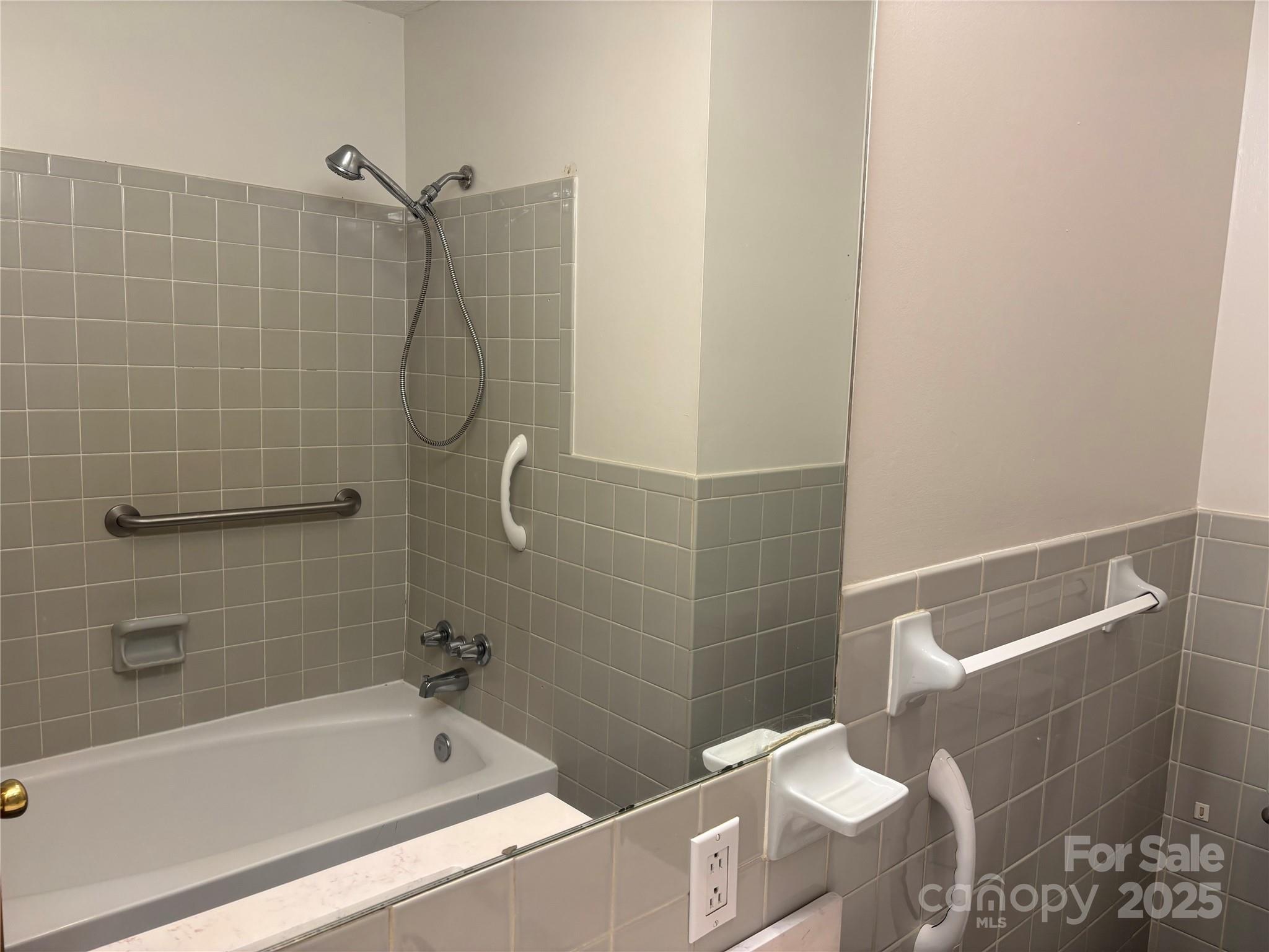 105 Cooper Drive Nebo, NC 28761 - Photo 13 of 17 a bathroom with a shower and a bathtub