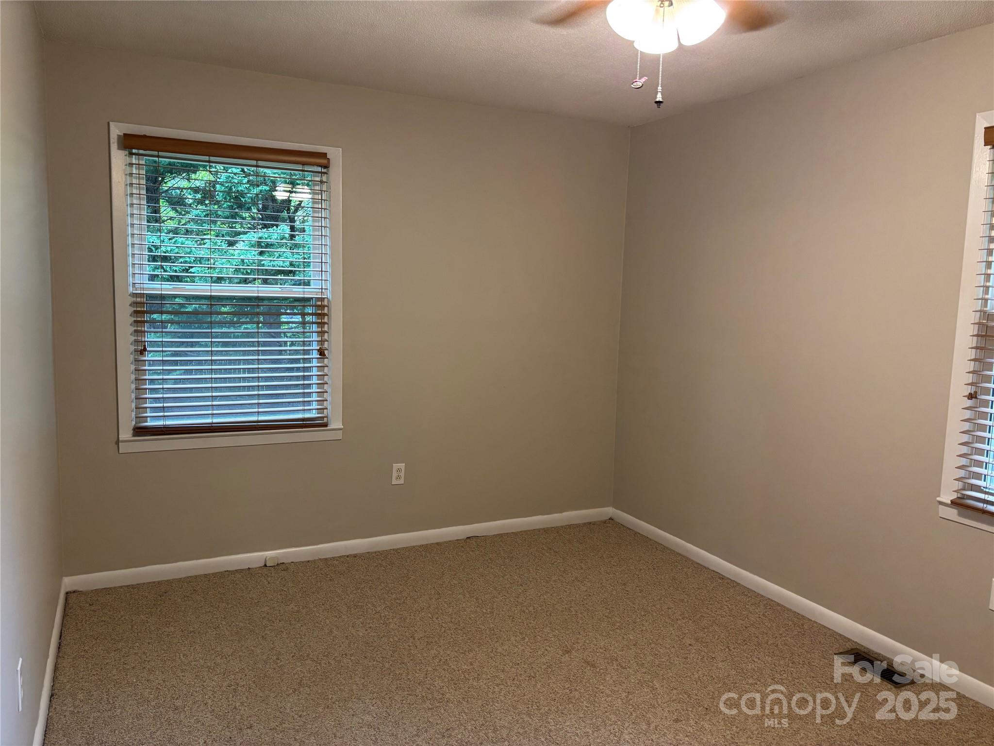 105 Cooper Drive Nebo, NC 28761 - Photo 14 of 17 an empty room with a window