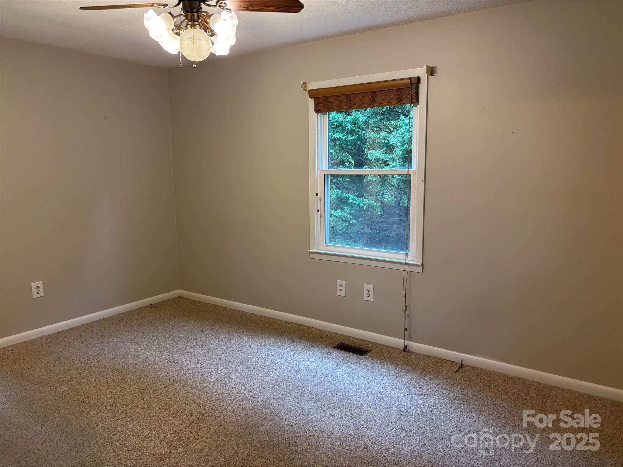105 Cooper Drive Nebo, NC 28761 - Photo 15 of 17 an empty room with a window