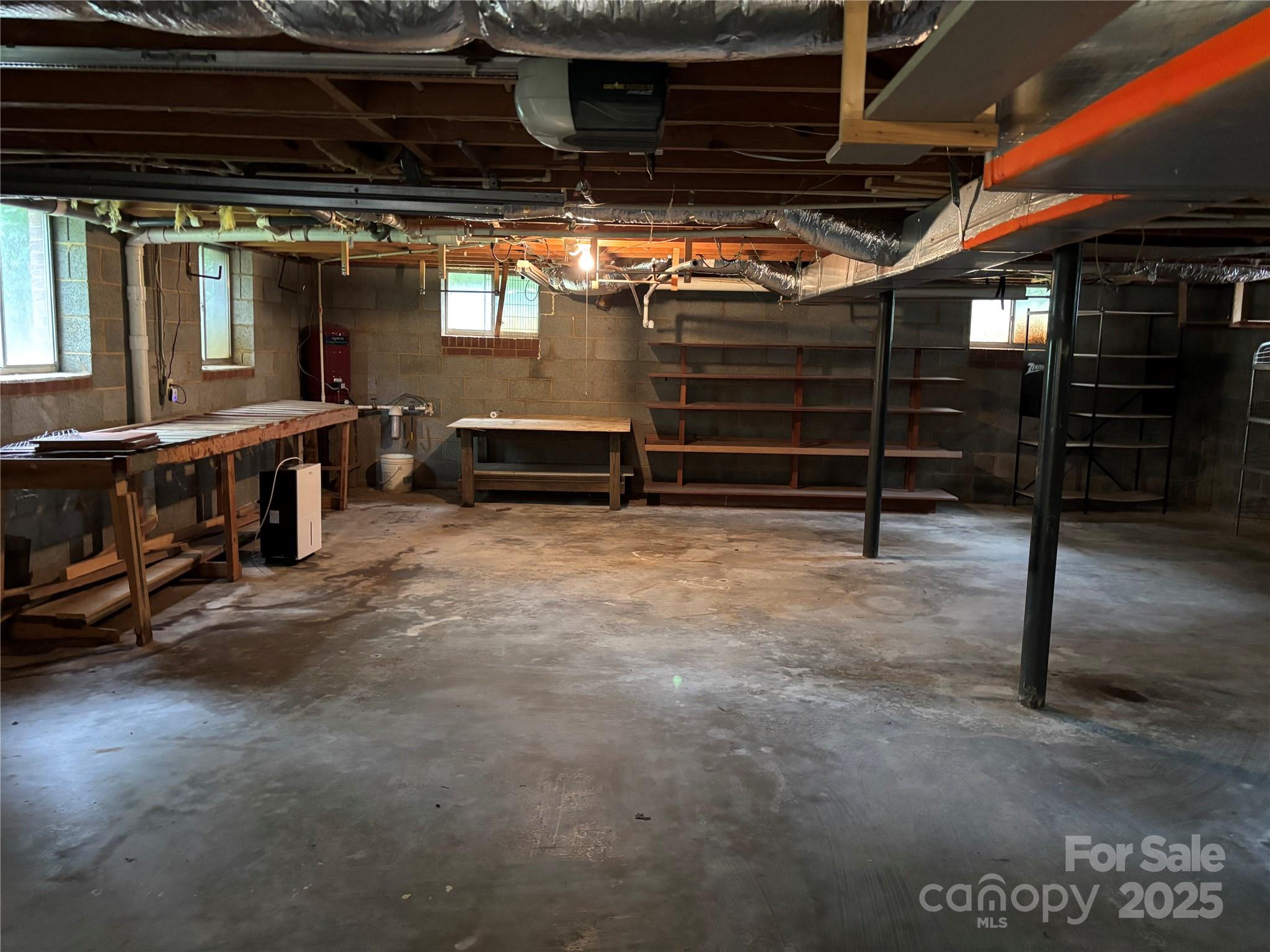 105 Cooper Drive Nebo, NC 28761 - Photo 16 of 17 a view of an empty room with gym equipment