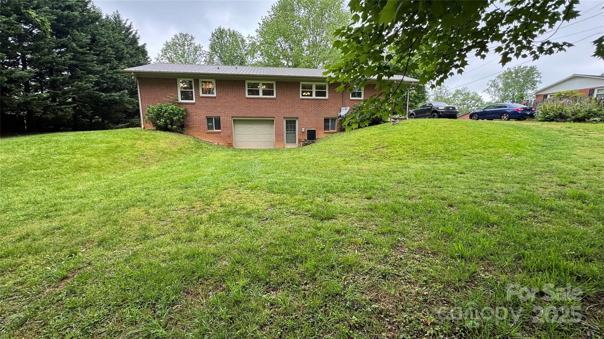 105 Cooper Drive Nebo, NC 28761 - Photo 3 of 17 a view of a house with a yard