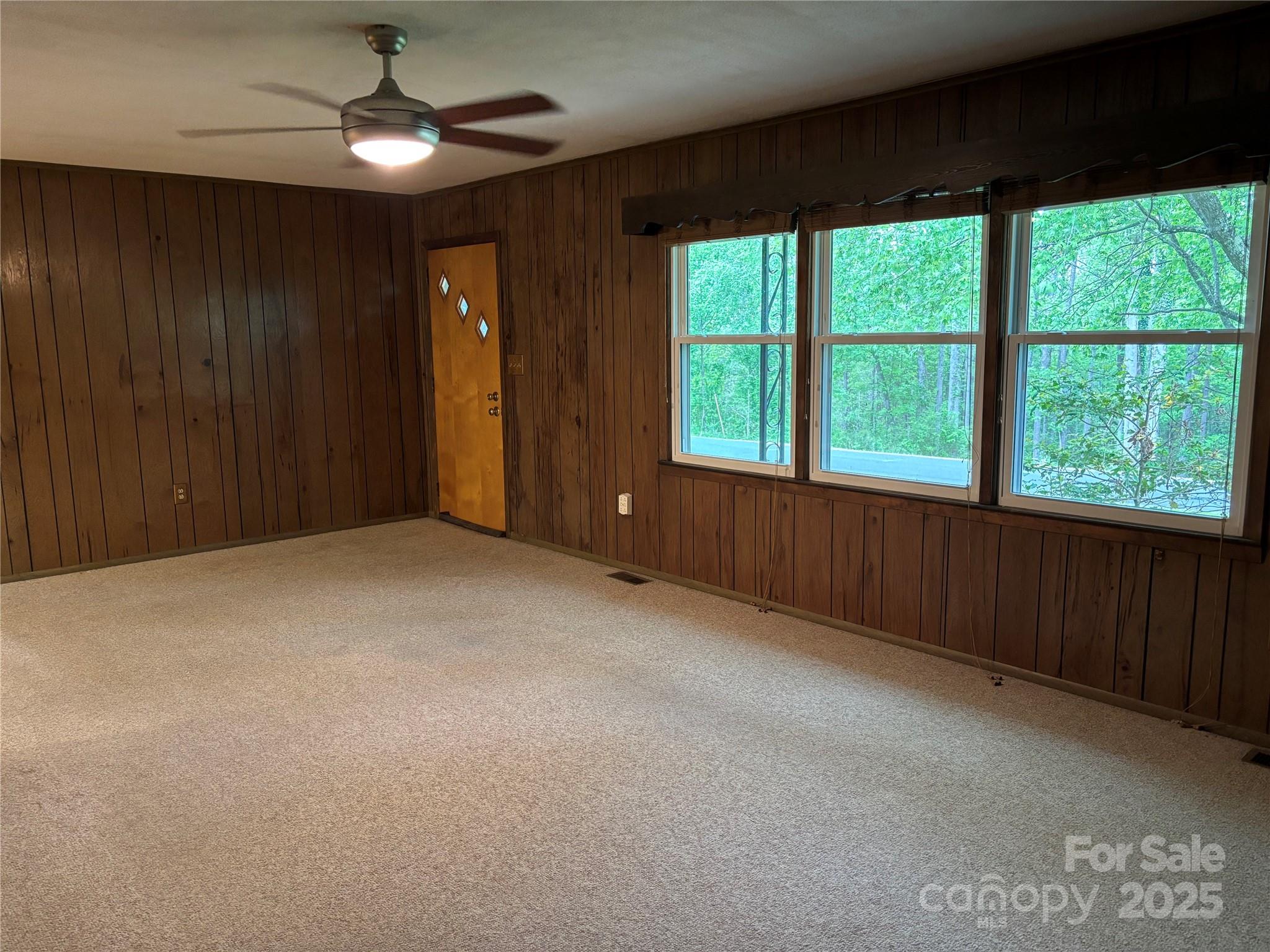 105 Cooper Drive Nebo, NC 28761 - Photo 9 of 17 a view of an empty room with a window
