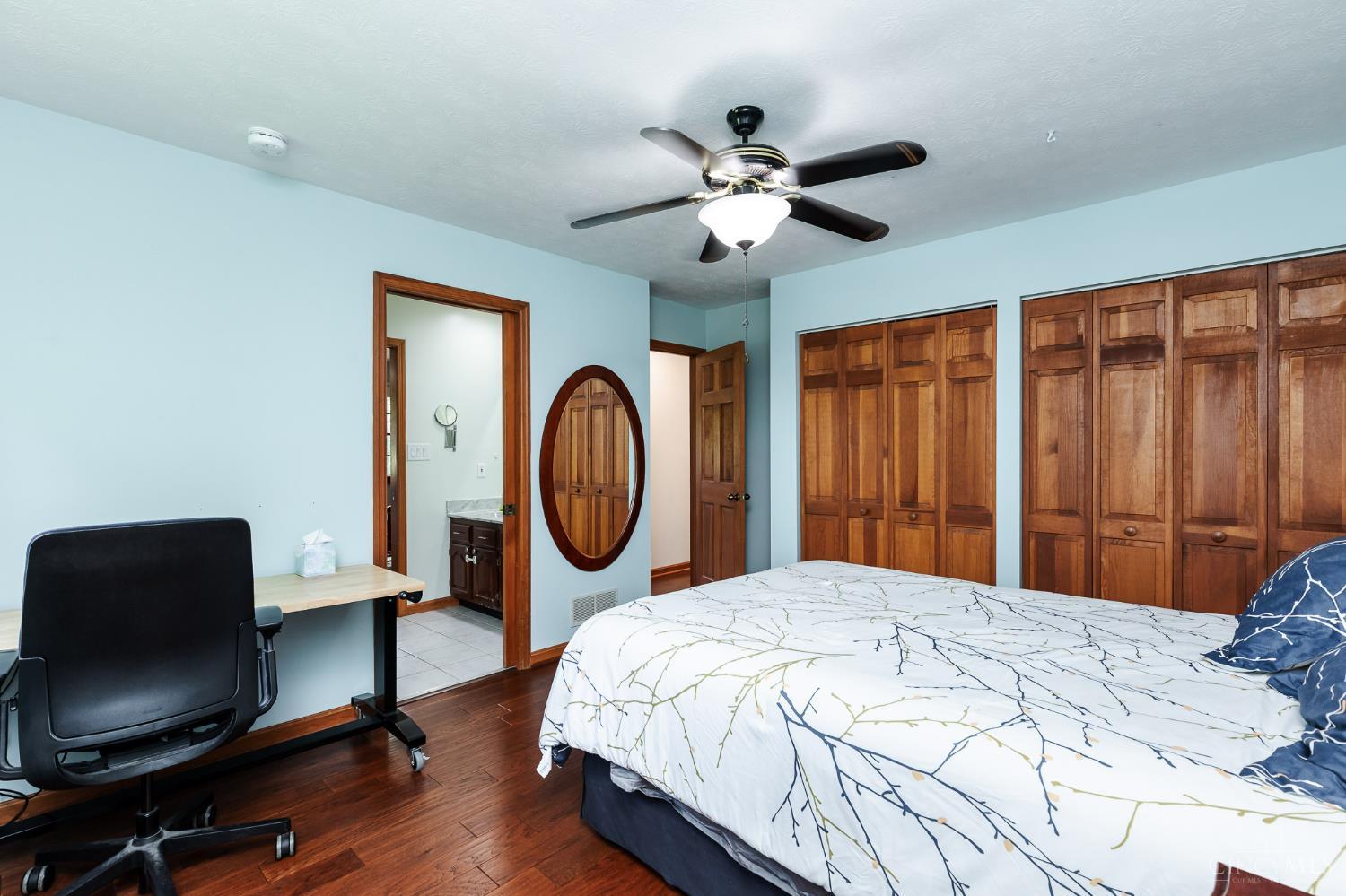 623 Ibold Road Loveland, OH 45140 - Photo 22 of 35 This generously sized secondary bedroom features abundant closet space and an adjoining Jack & Jill bath shared with the neighboring bedroom—perfect for privacy and functionality.