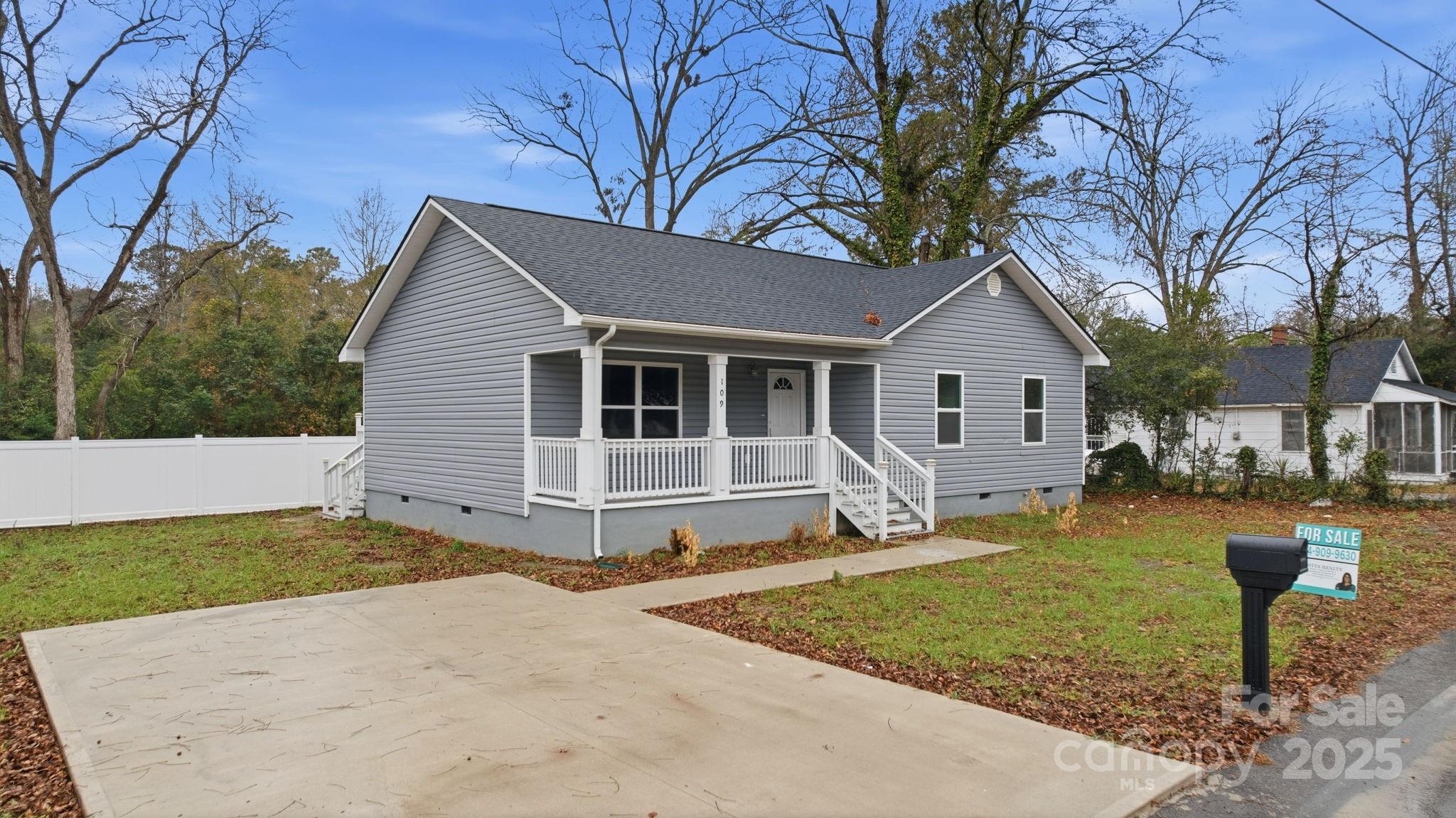 109 Haddock Road Northwest Orangeburg, SC 29115 - Photo 45 of 48 a view of a house with a yard covered in snow