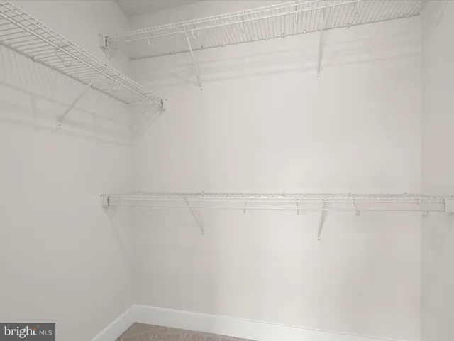 a view of a room with racks on the wall