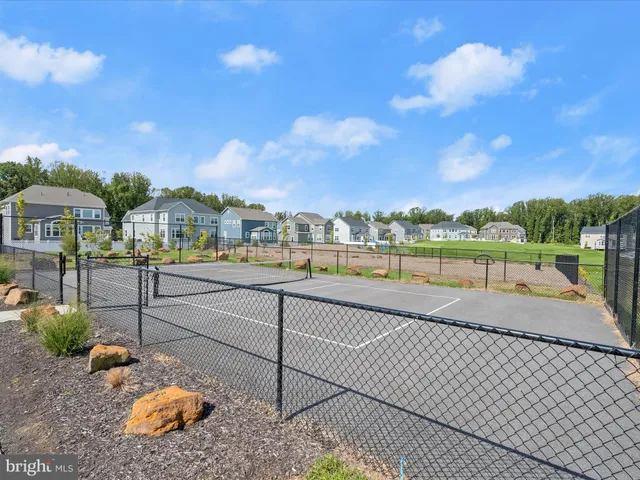 an outdoor space with furniture and garden