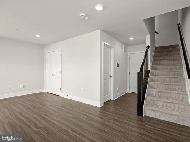 a view of entryway with wooden floor