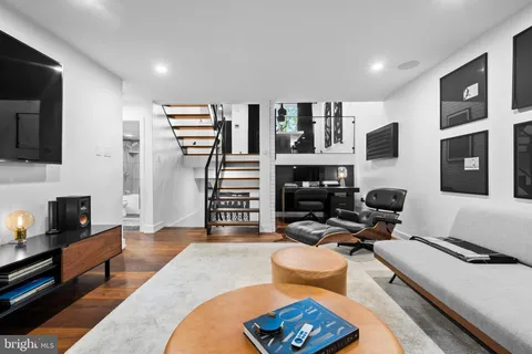 a bedroom with a bed and a table