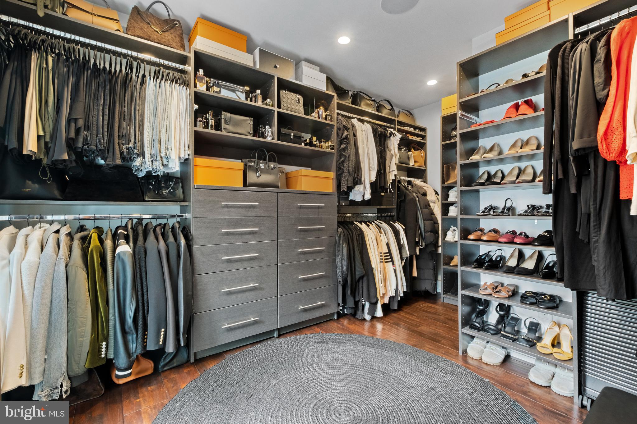 502 Delancey Street, Unit A Philadelphia, PA 19106 - Photo 21 of 32 a view of walk in closet with clothes and shoes