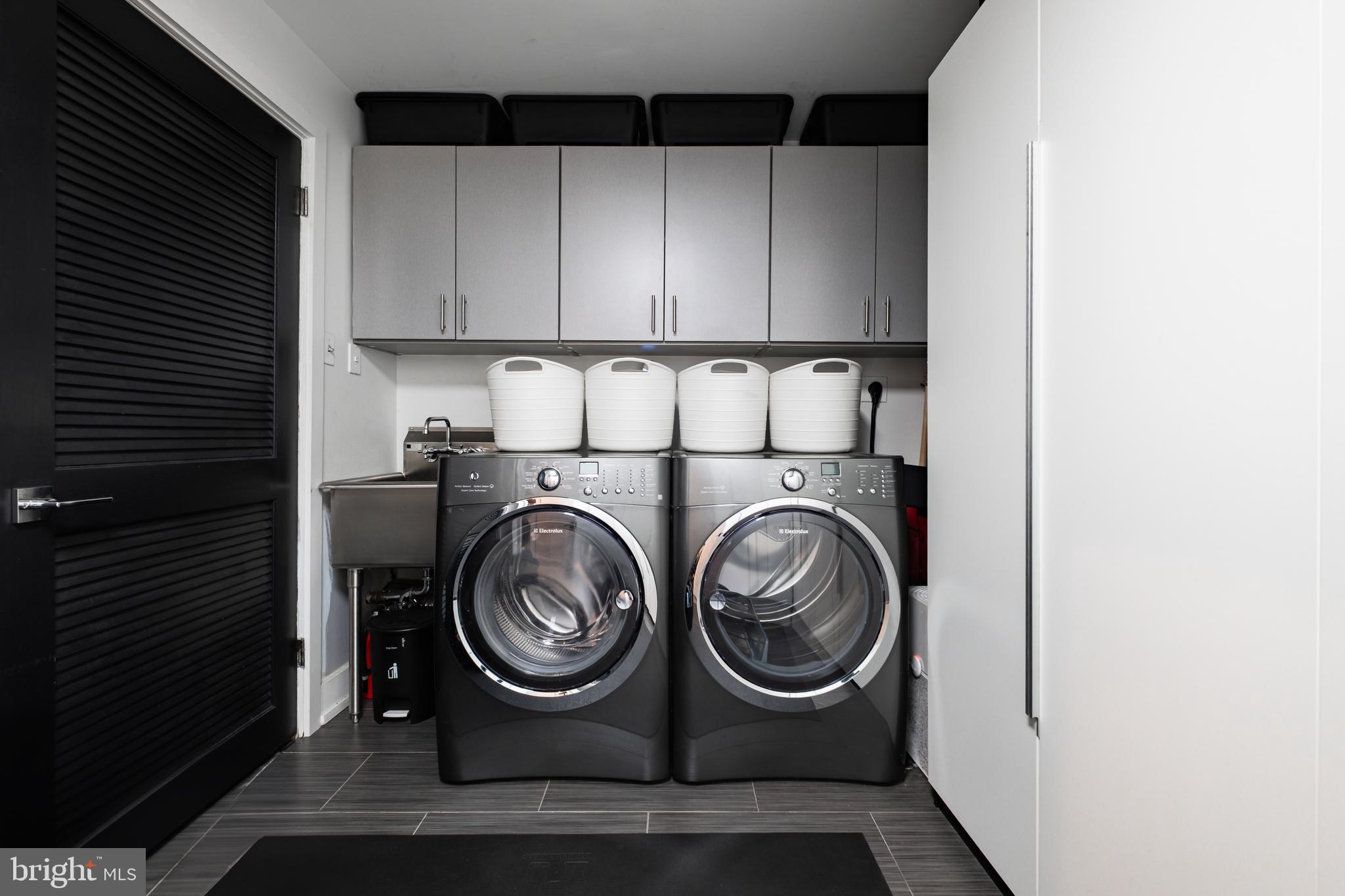502 Delancey Street, Unit A Philadelphia, PA 19106 - Photo 29 of 32 a close up view of washer and dryer