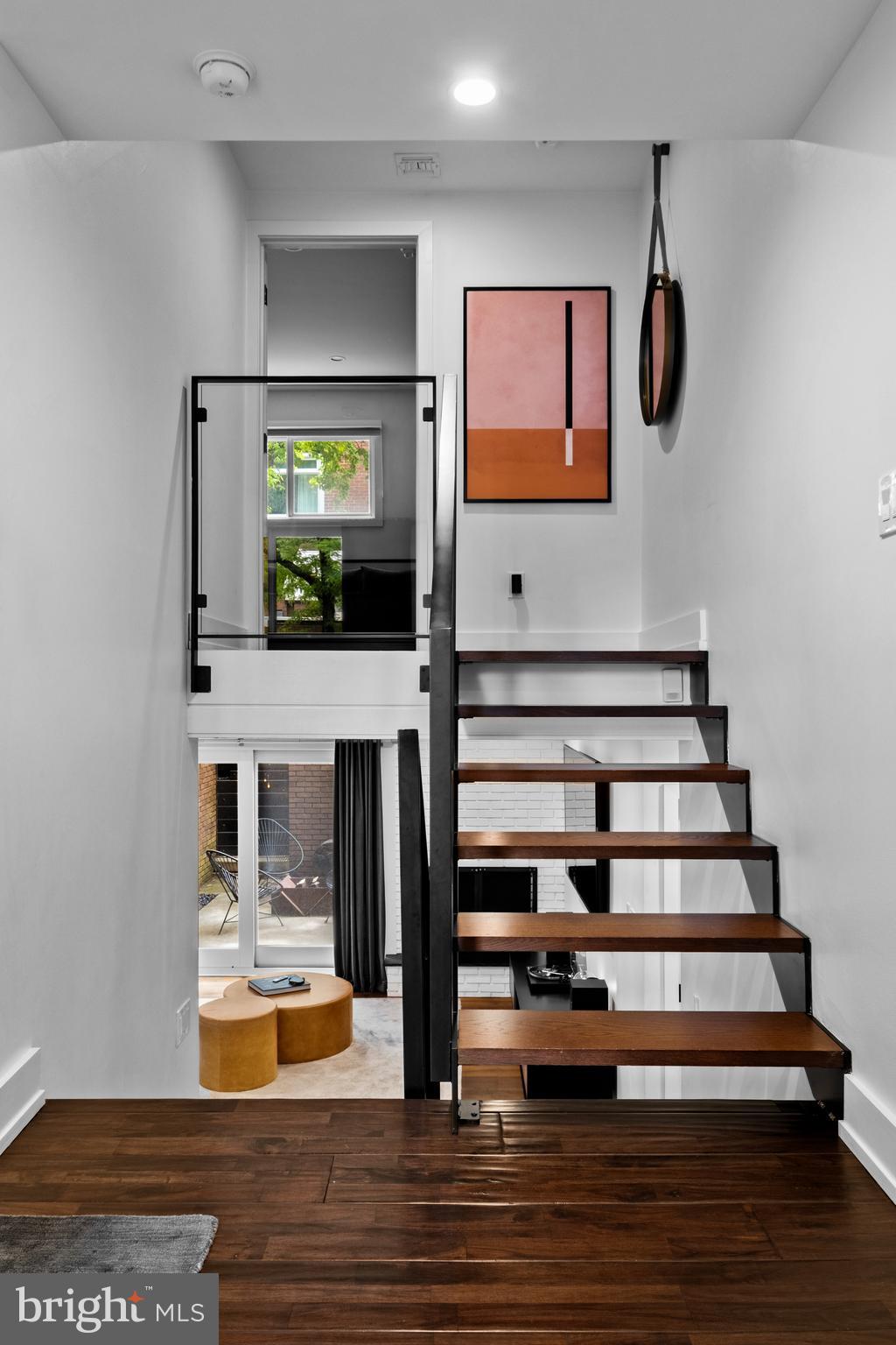 502 Delancey Street, Unit A Philadelphia, PA 19106 - Photo 10 of 32 a view of entryway and hall with wooden floor