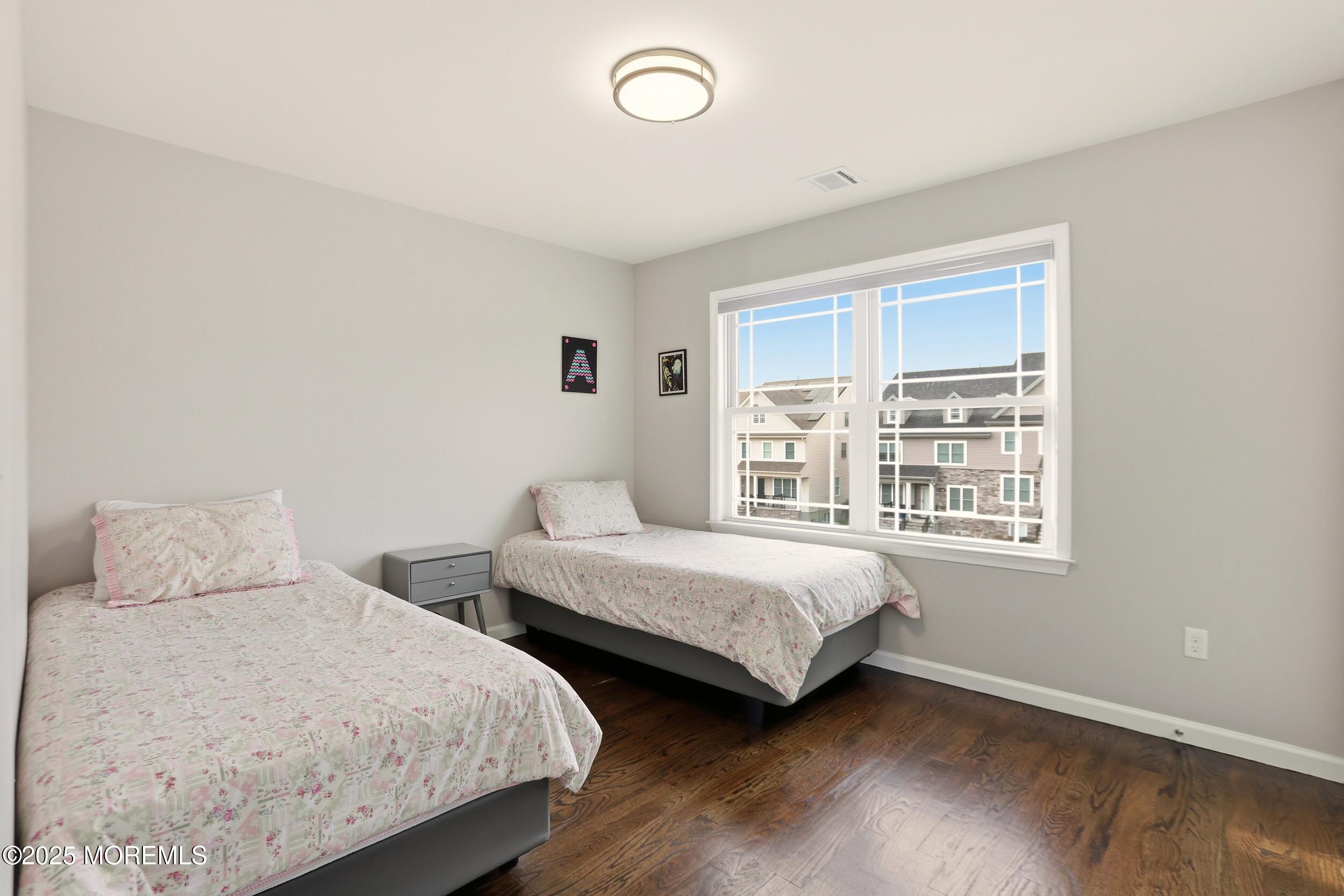 119 North Zinfandel Road Lakewood, NJ 08701 - Photo 19 of 29 a bedroom with two beds and a window