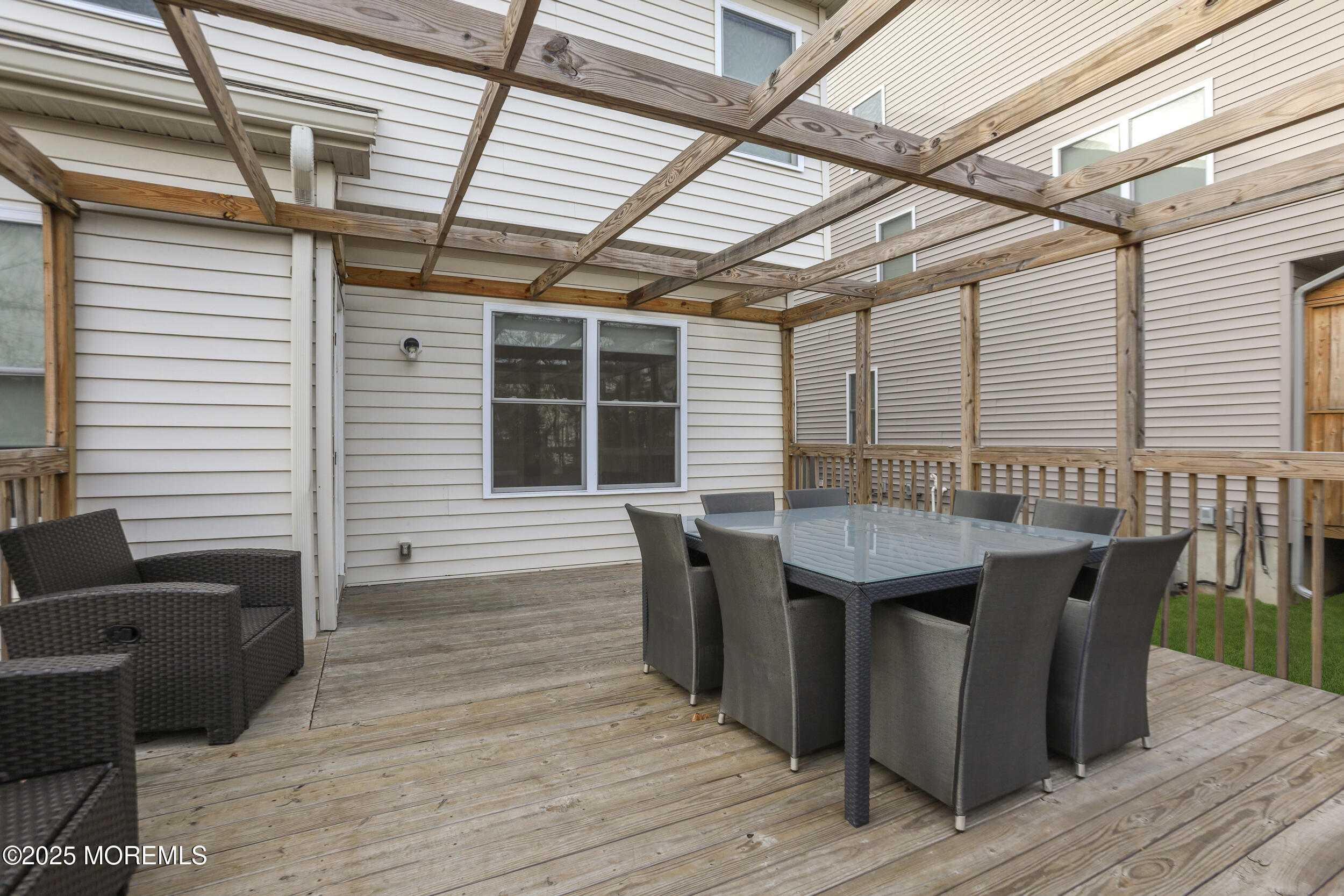 119 North Zinfandel Road Lakewood, NJ 08701 - Photo 29 of 29 a dinning table and chairs in wooden deck