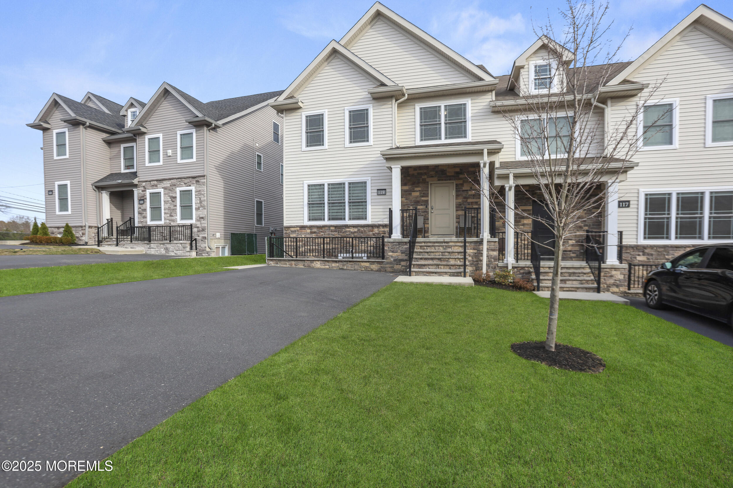 119 North Zinfandel Road Lakewood, NJ 08701 - Photo 3 of 29 a house that has a garden