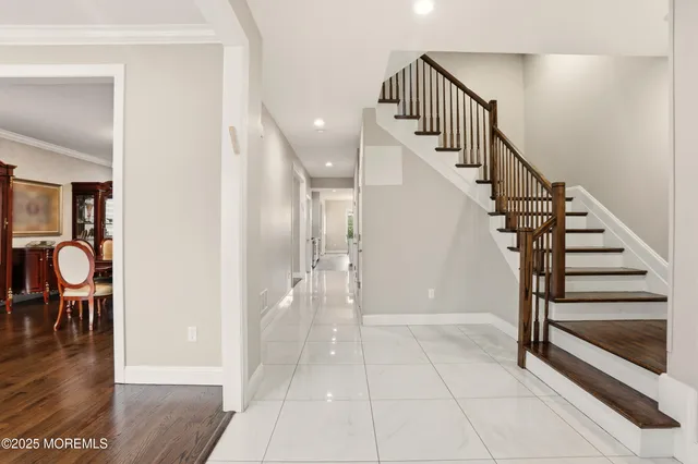 a view of entryway with wooden floor
