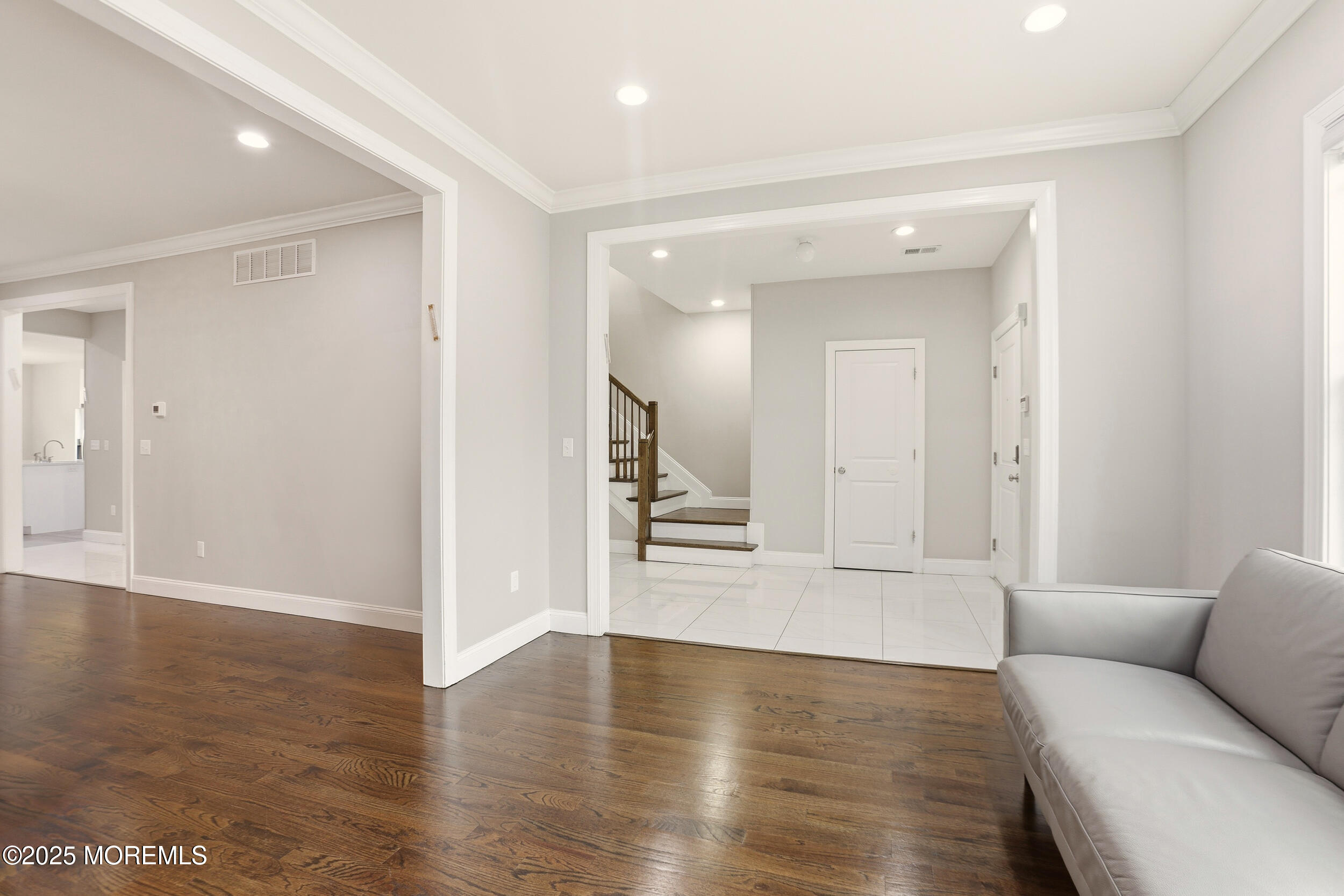 119 North Zinfandel Road Lakewood, NJ 08701 - Photo 7 of 29 a view of a livingroom with wooden floor and cabinet